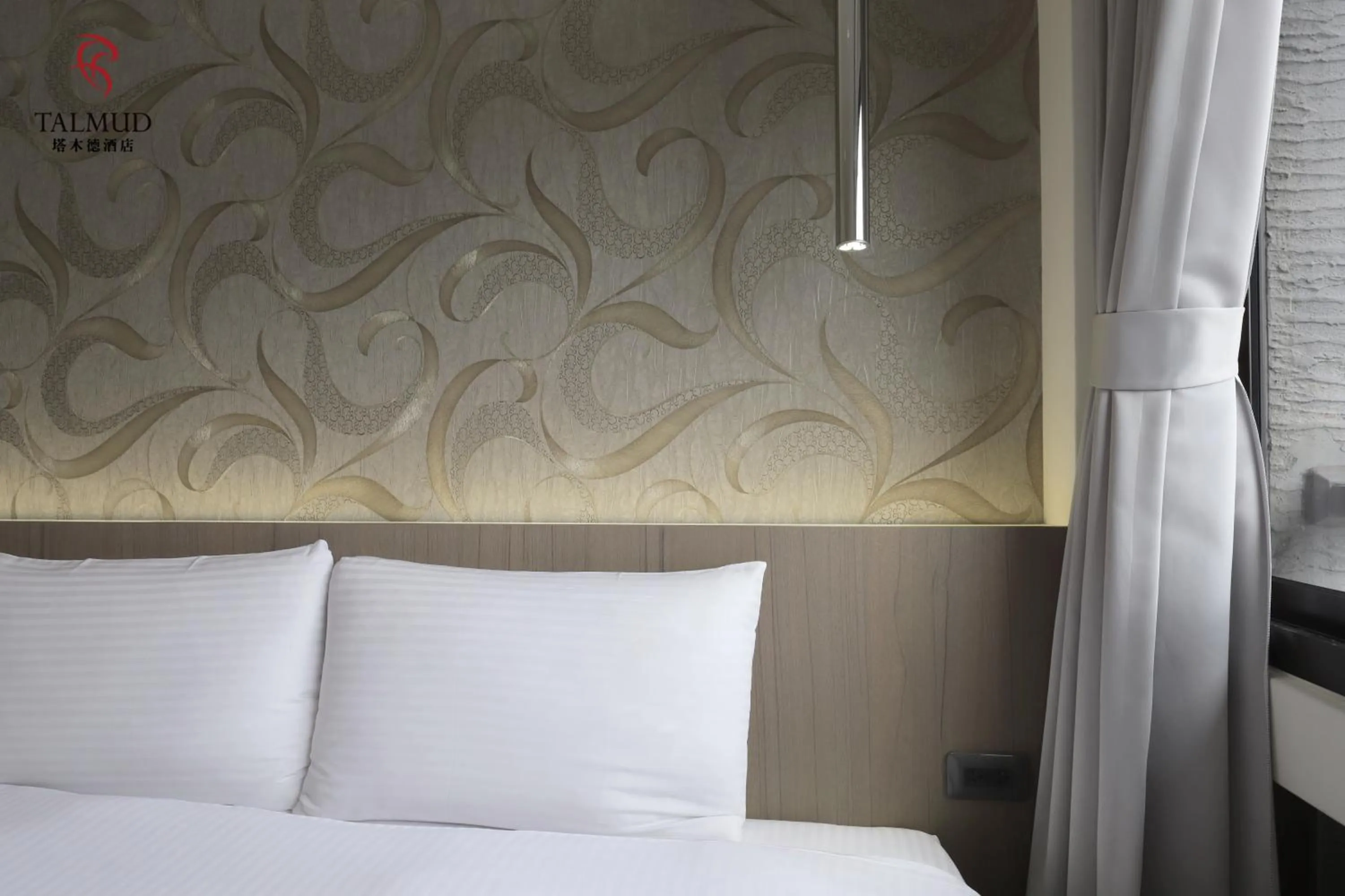 Photo of the whole room, Bed in Talmud Hotel Taichung