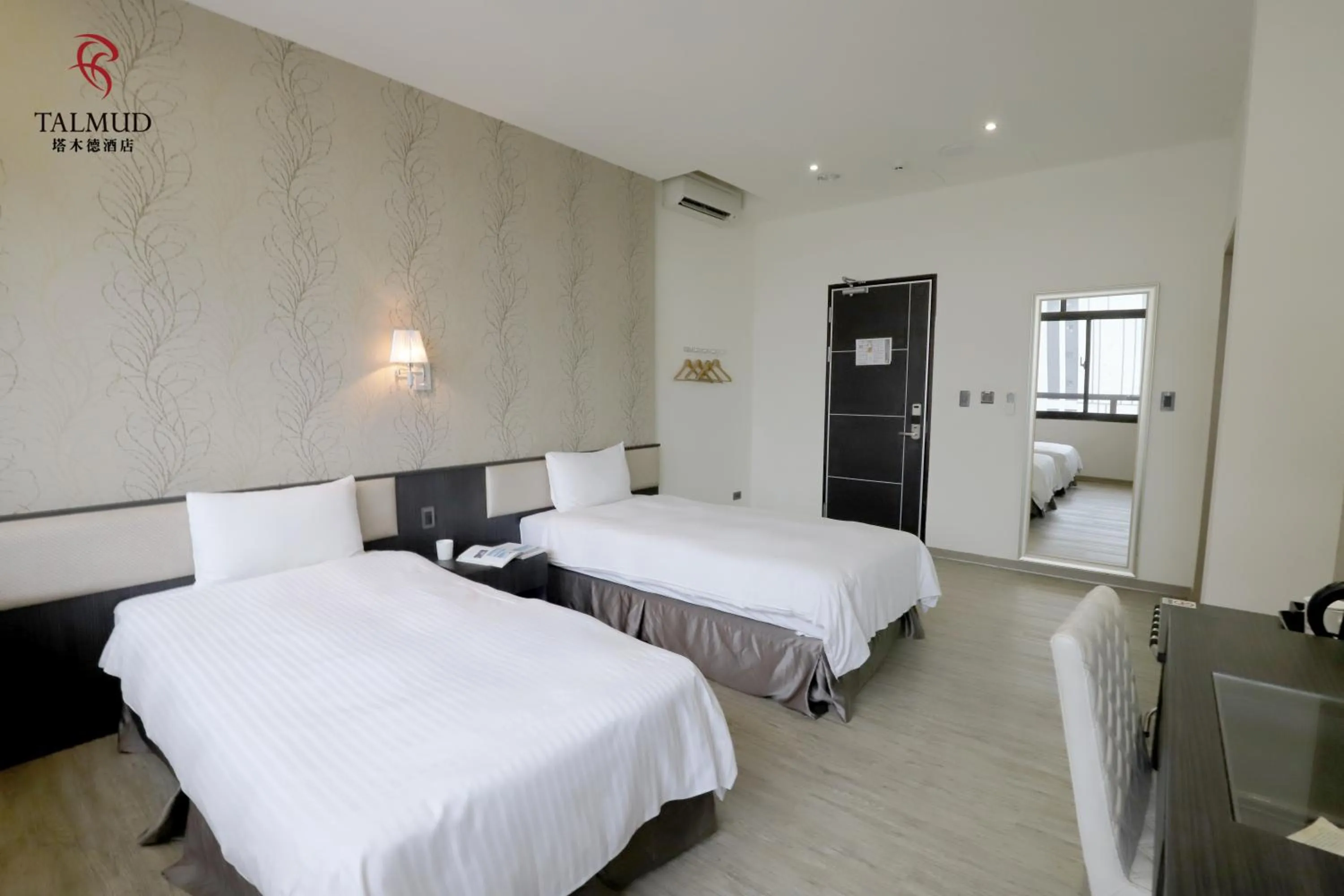 Photo of the whole room, Bed in Talmud Hotel Taichung
