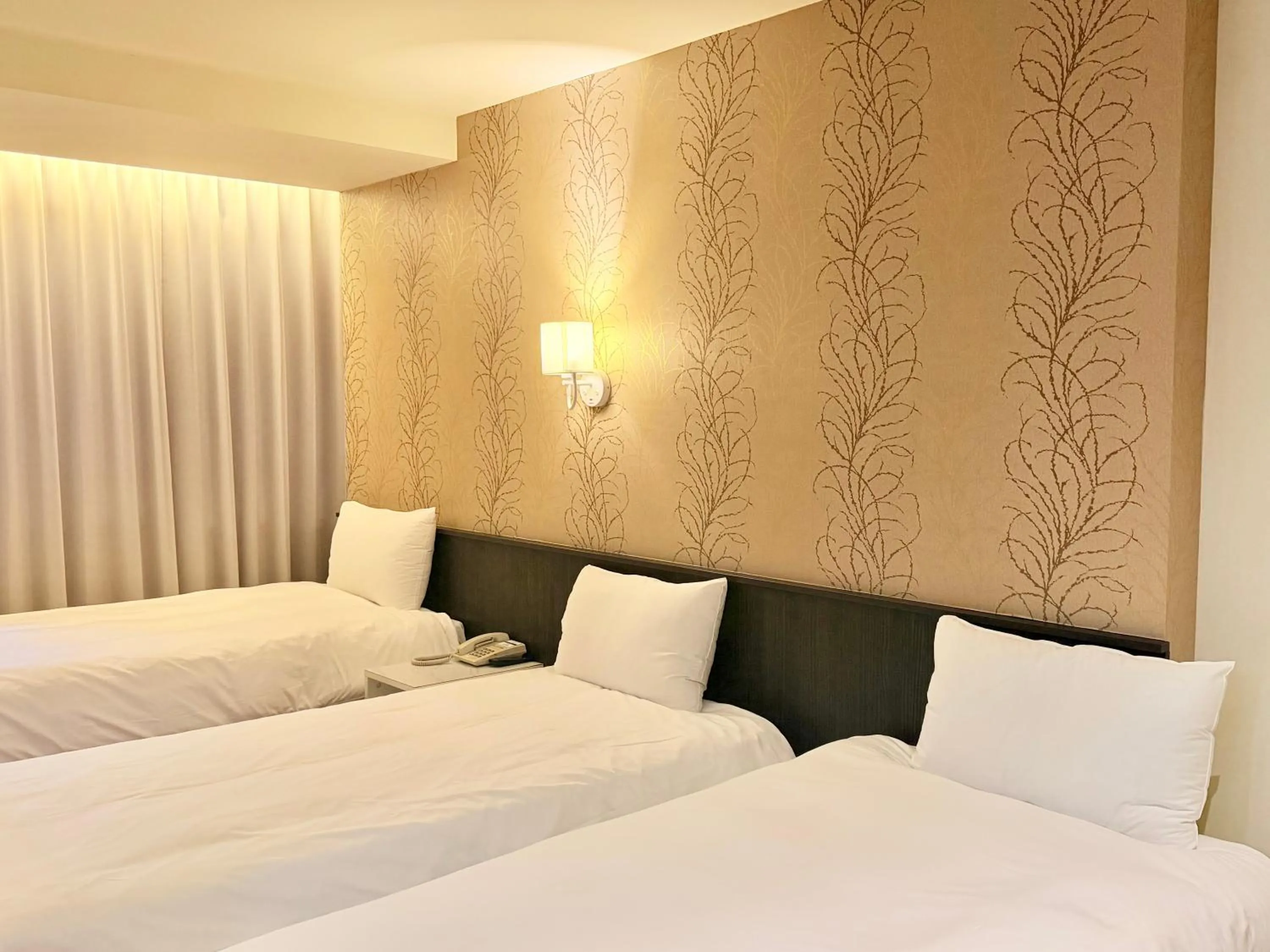 Bed in Talmud Hotel Taichung