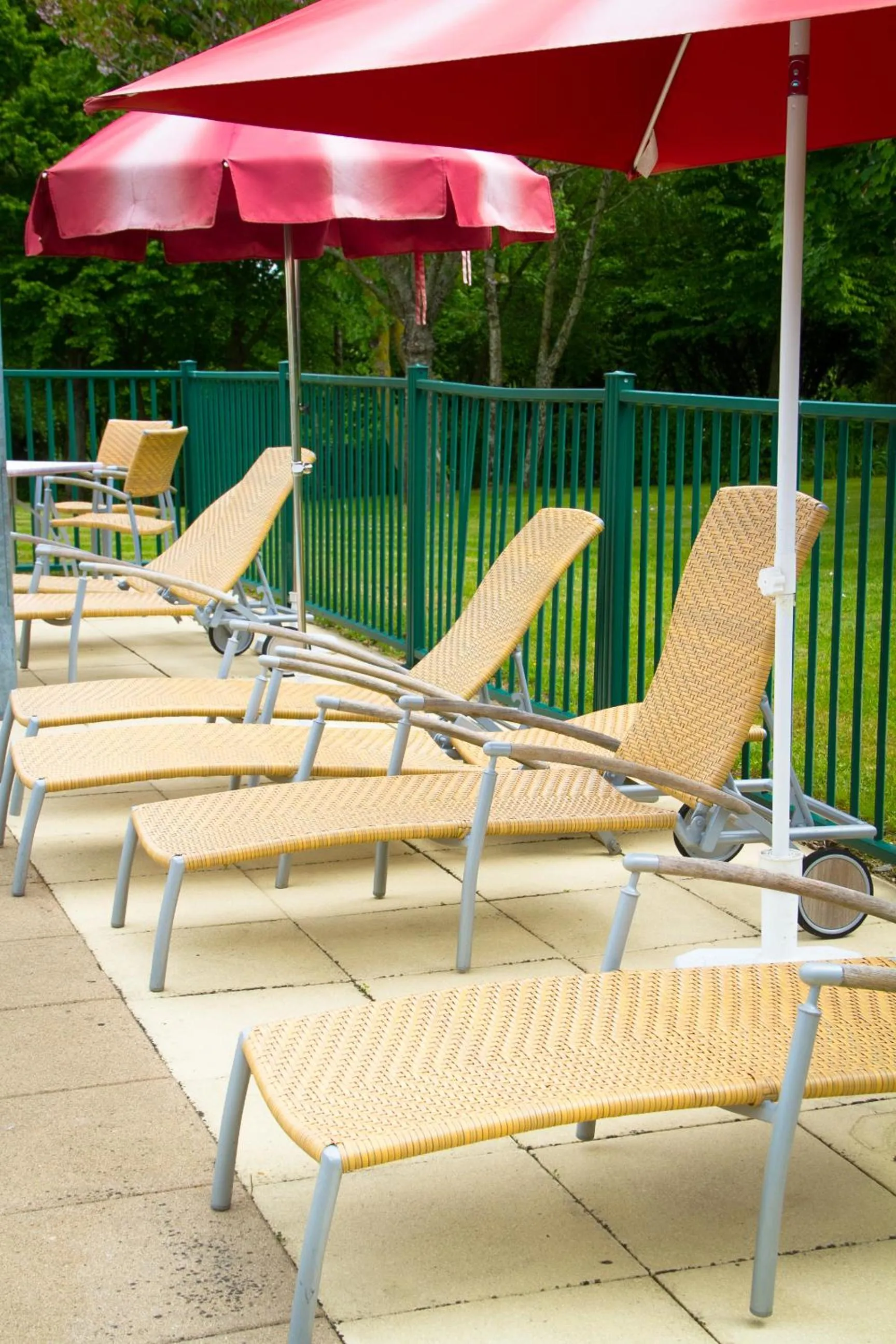 Swimming pool in Logis Hôtel & Restaurant L'ermitage