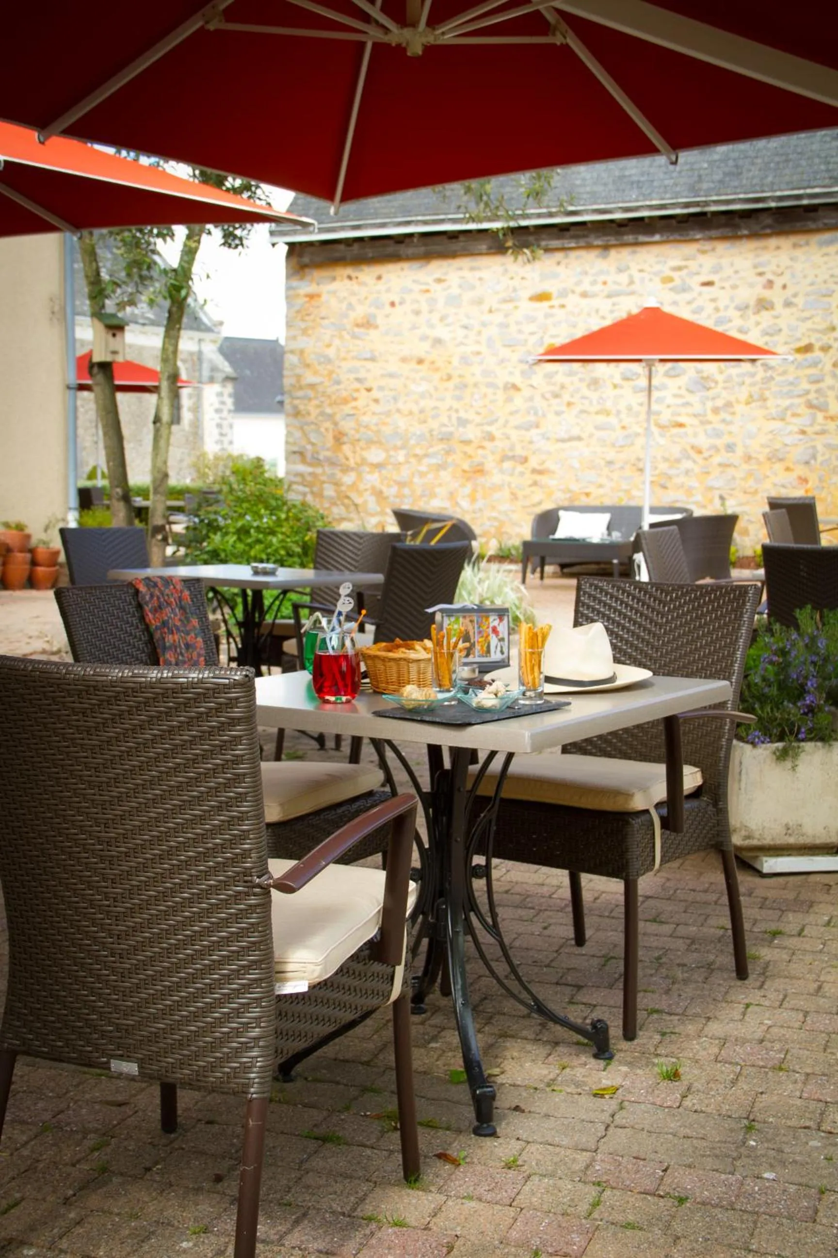 Balcony/Terrace in Logis Hôtel & Restaurant L'ermitage