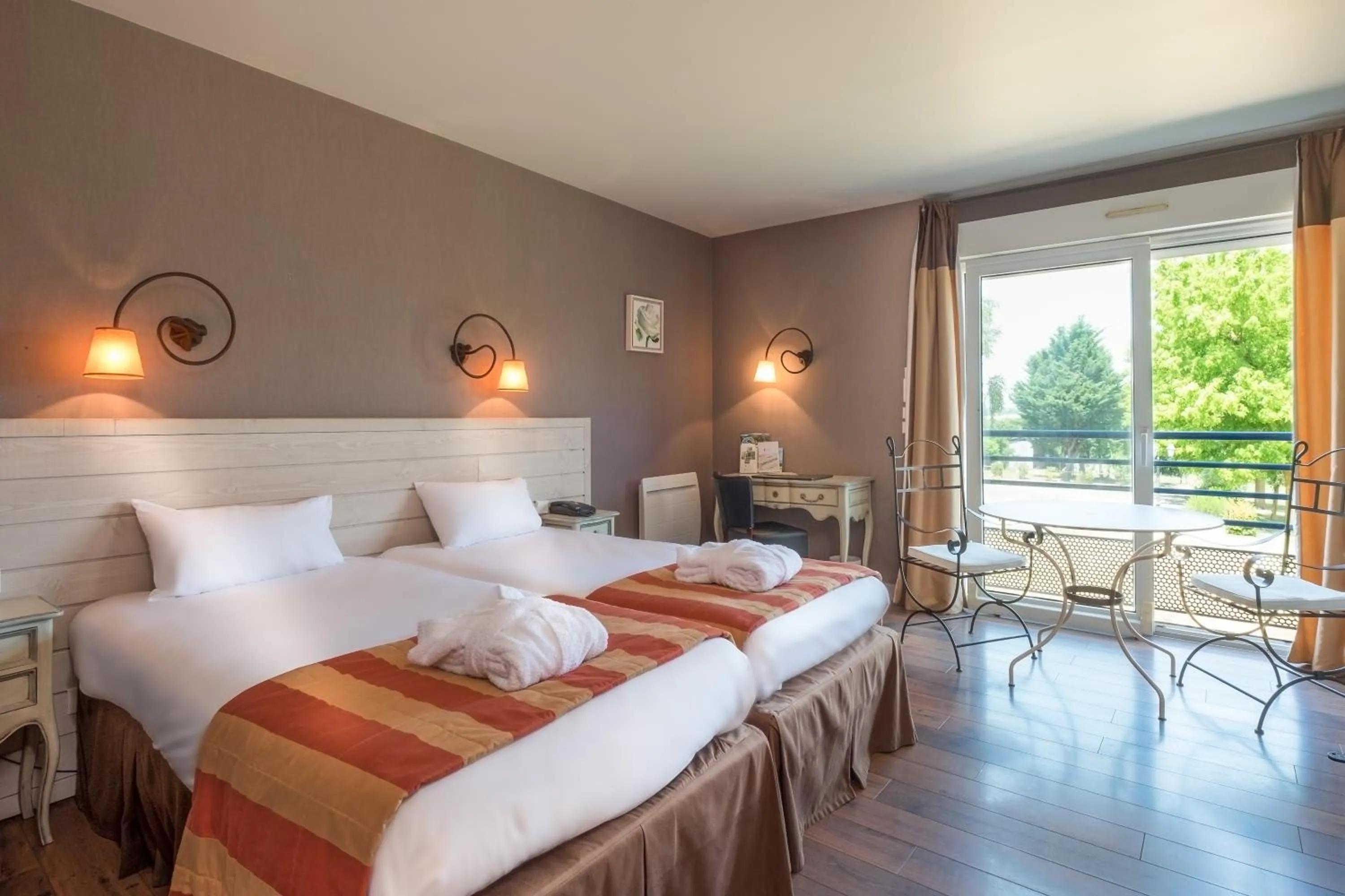 Photo of the whole room, Bed in Logis Hôtel & Restaurant L'ermitage