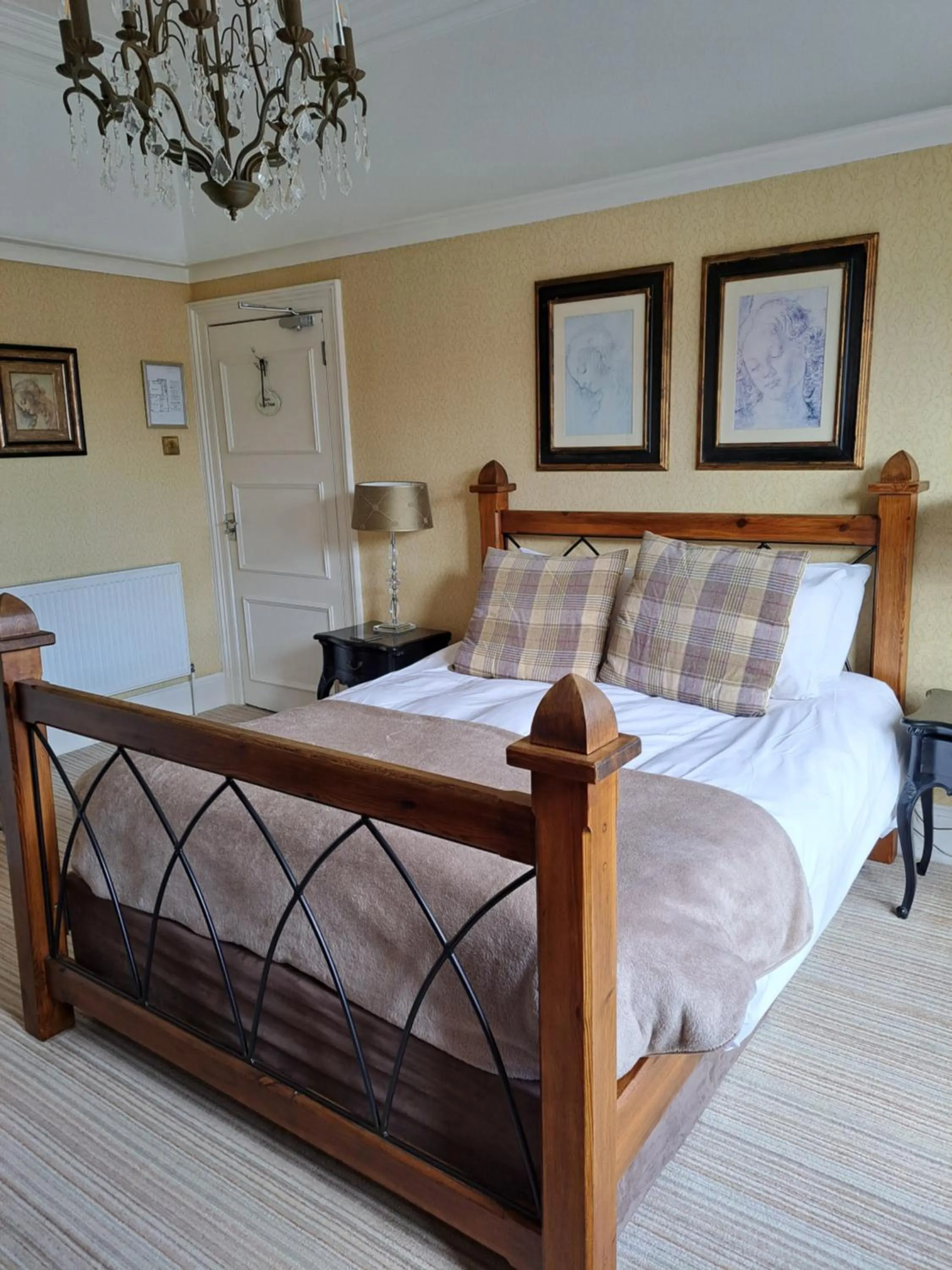 Bed in The Ambassador Townhouse