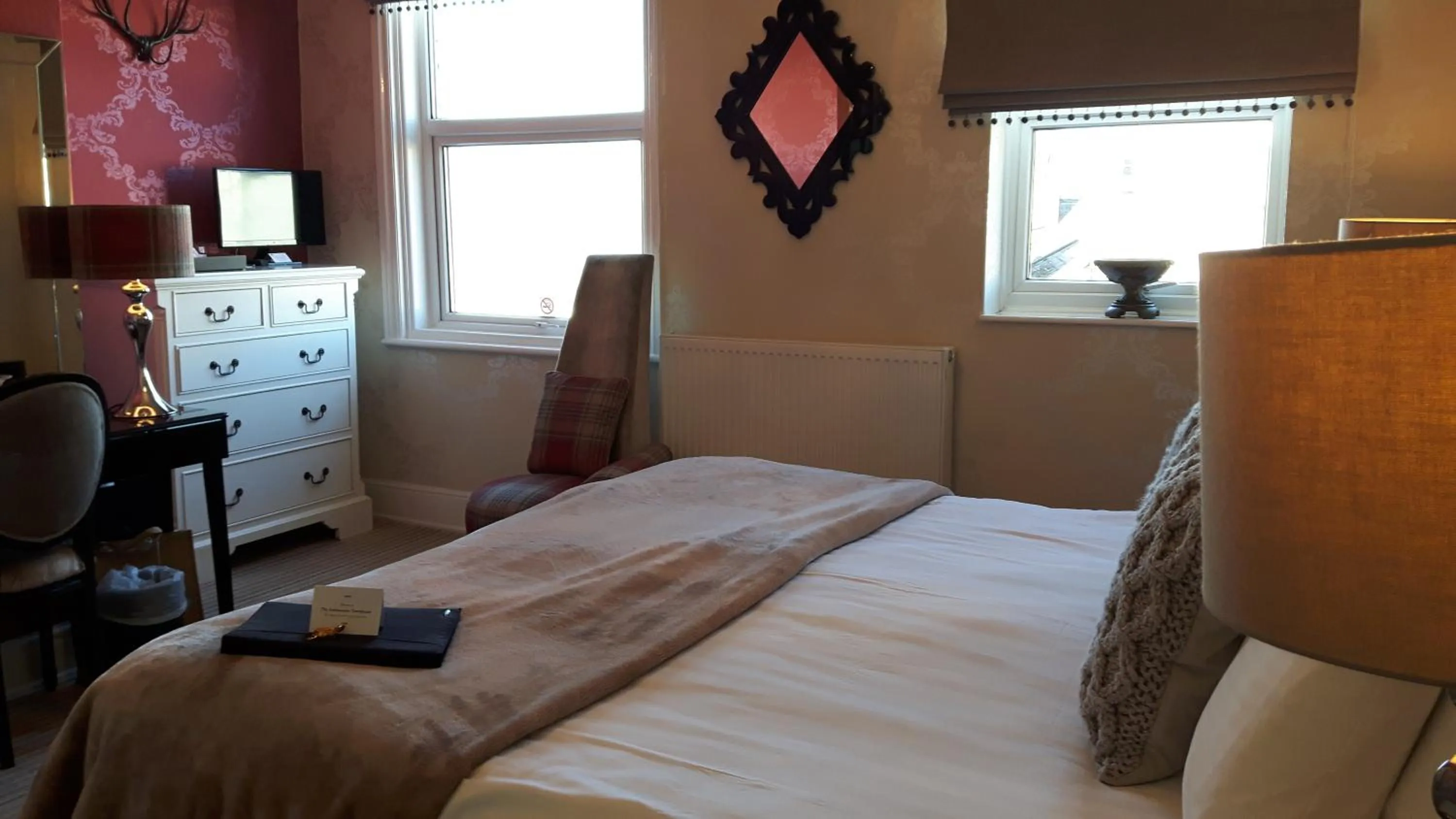 Bed in The Ambassador Townhouse