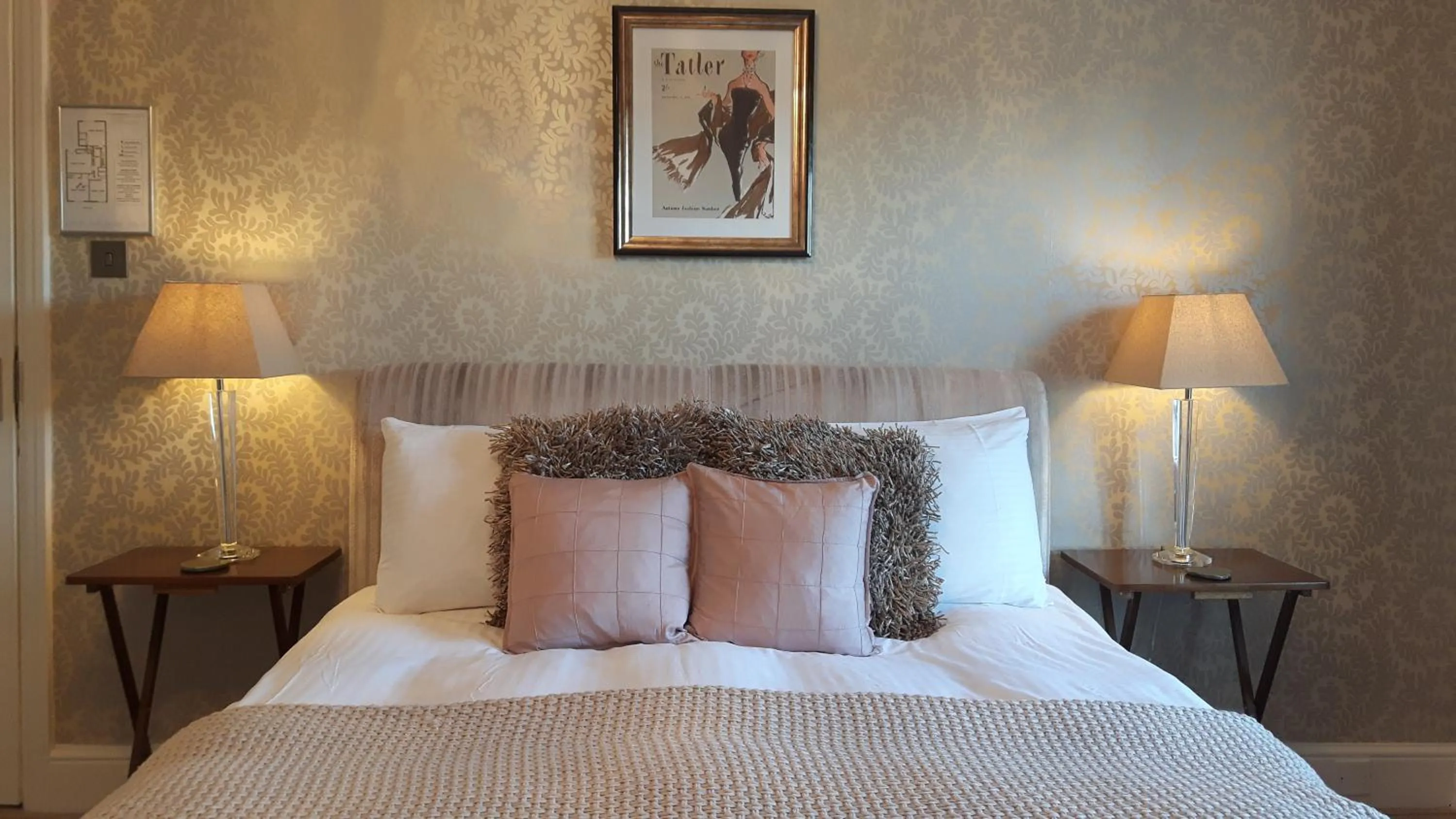 Bed in The Ambassador Townhouse