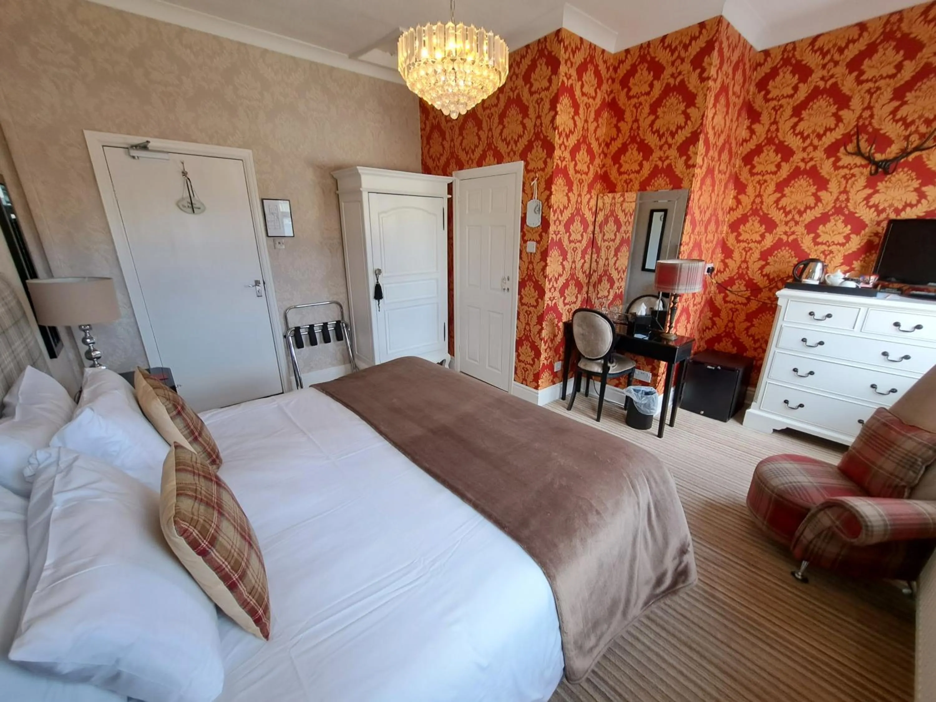 Bed in The Ambassador Townhouse