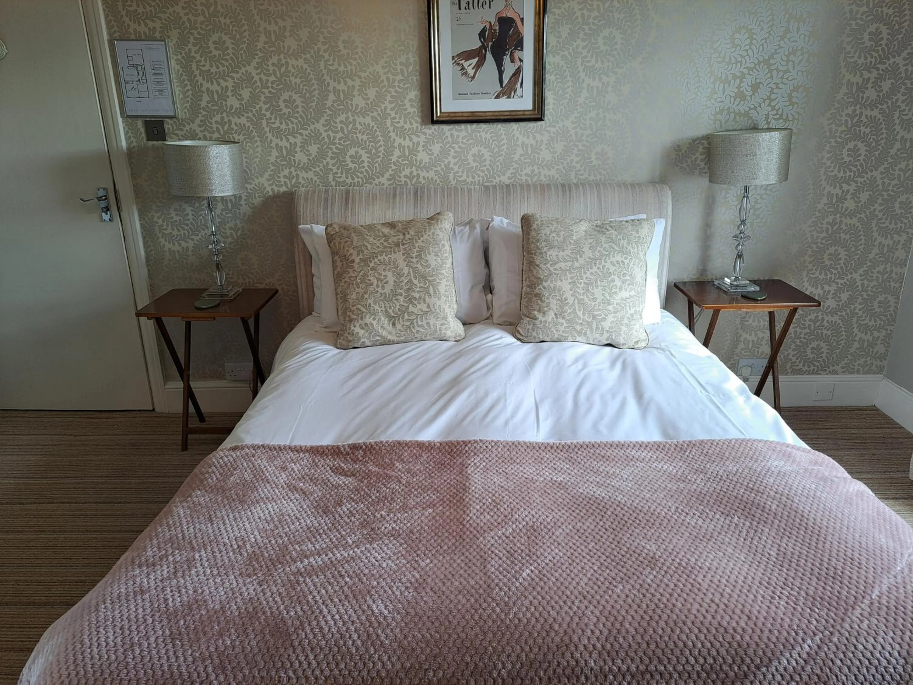 Bed in The Ambassador Townhouse
