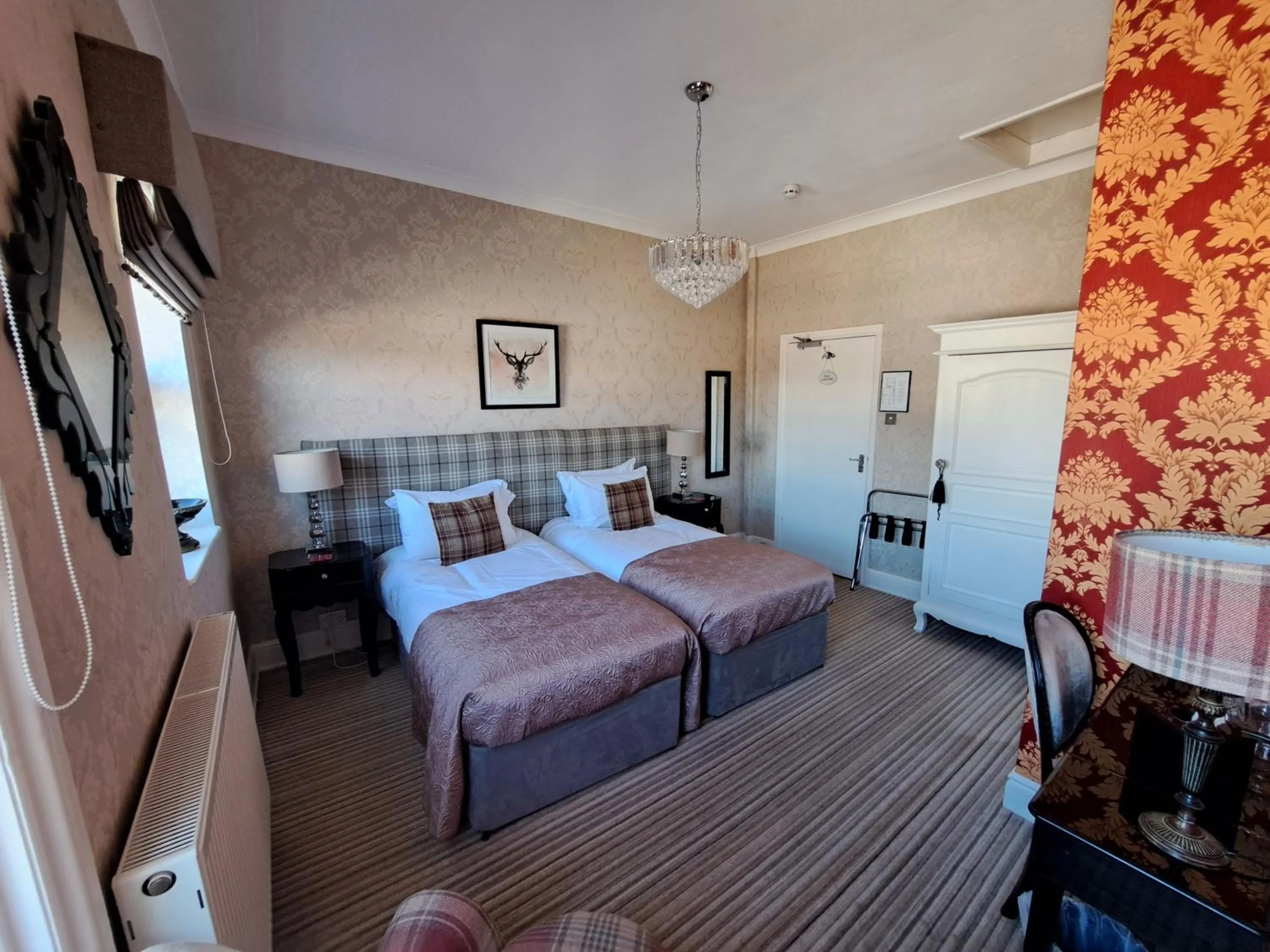 Bed in The Ambassador Townhouse