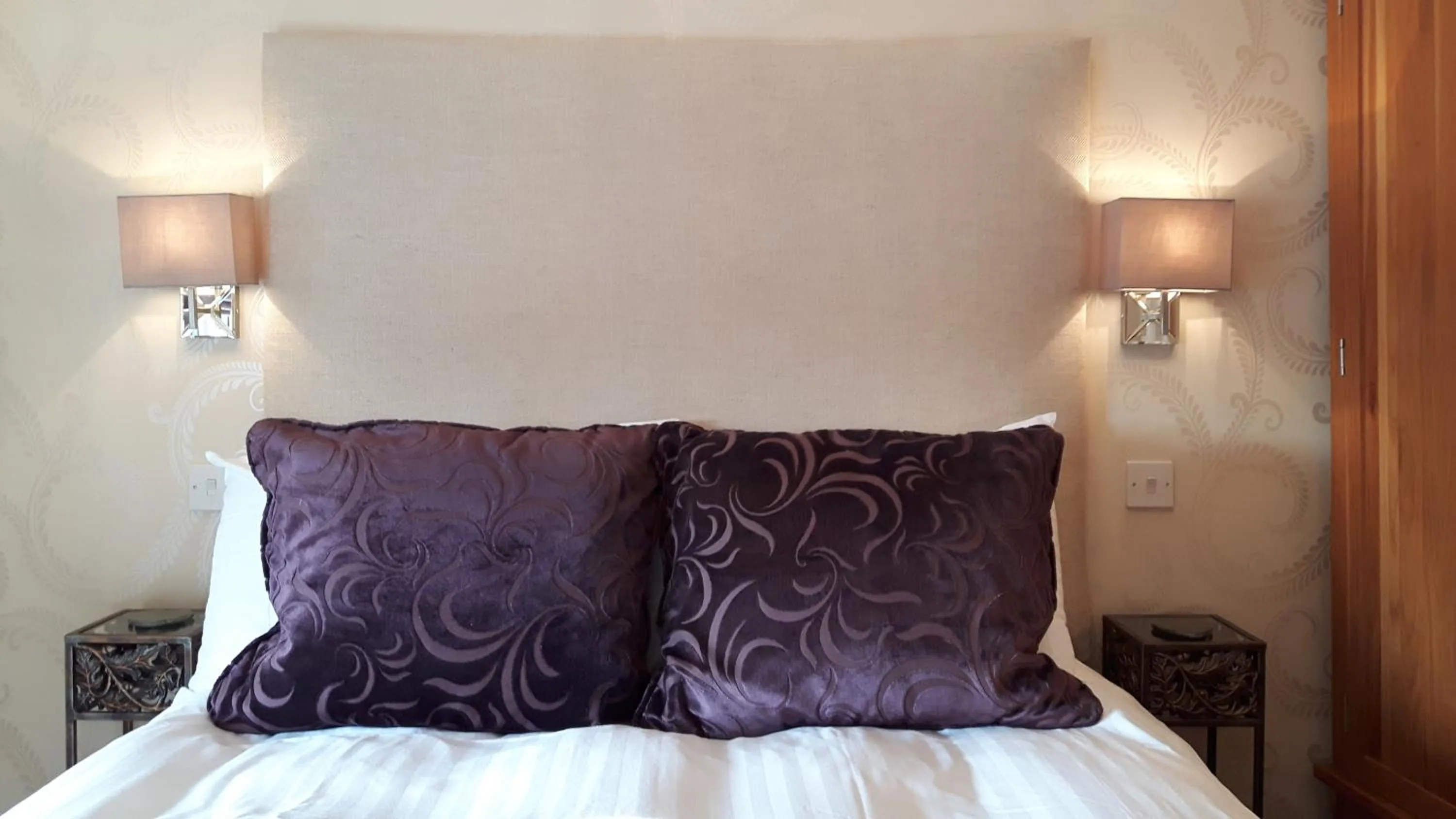 Bed in The Ambassador Townhouse