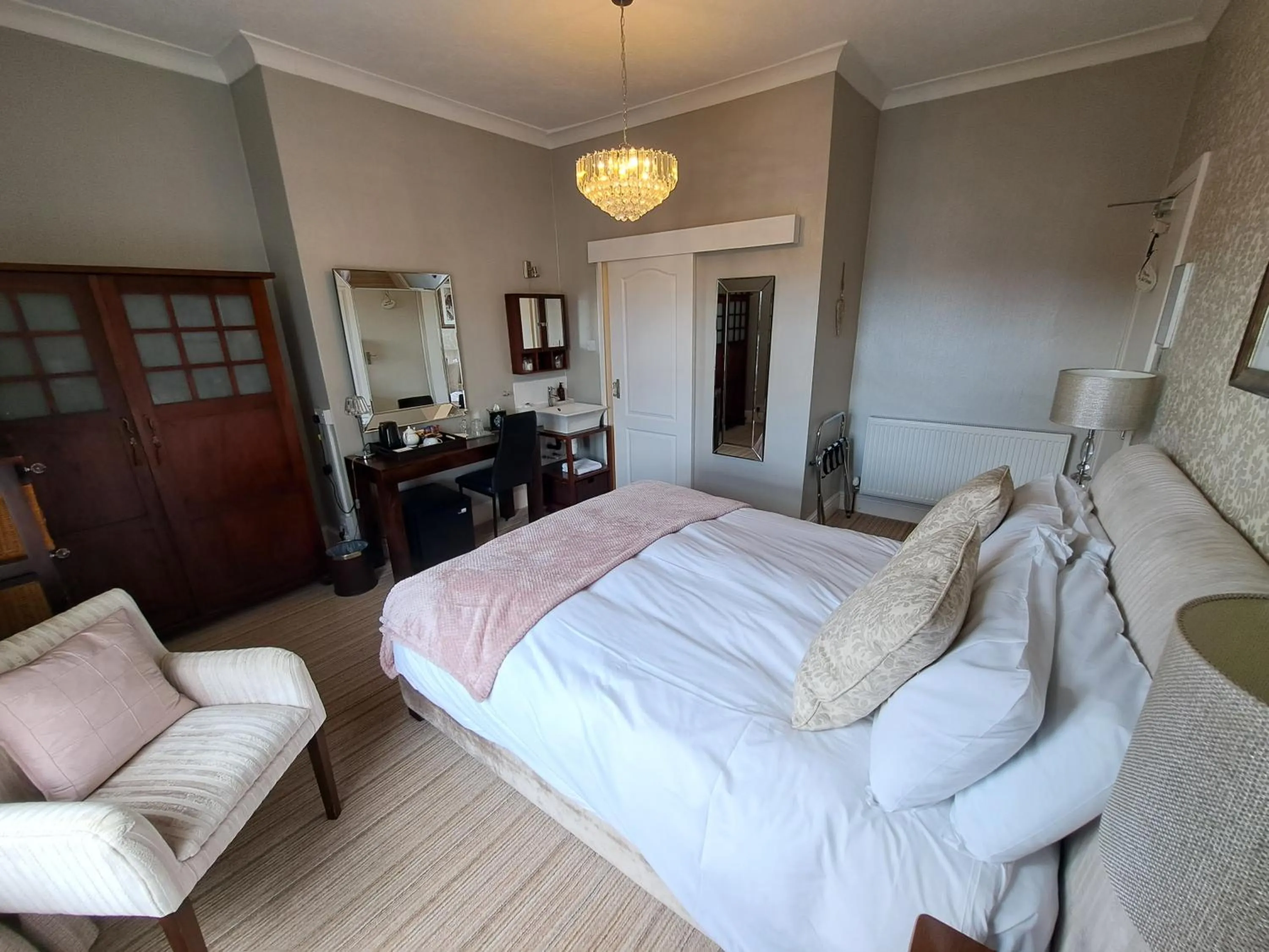 Bed in The Ambassador Townhouse