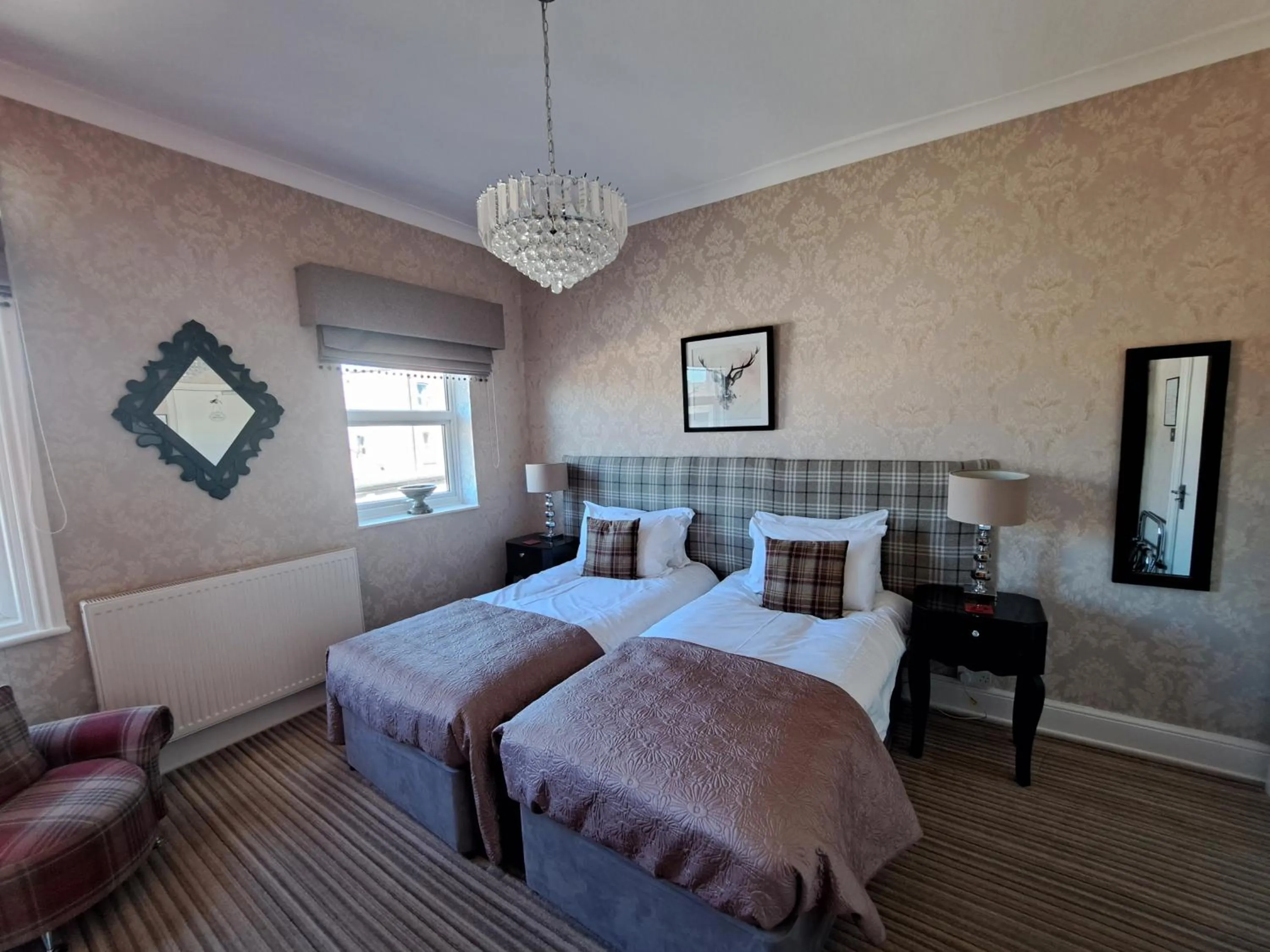 Bed in The Ambassador Townhouse