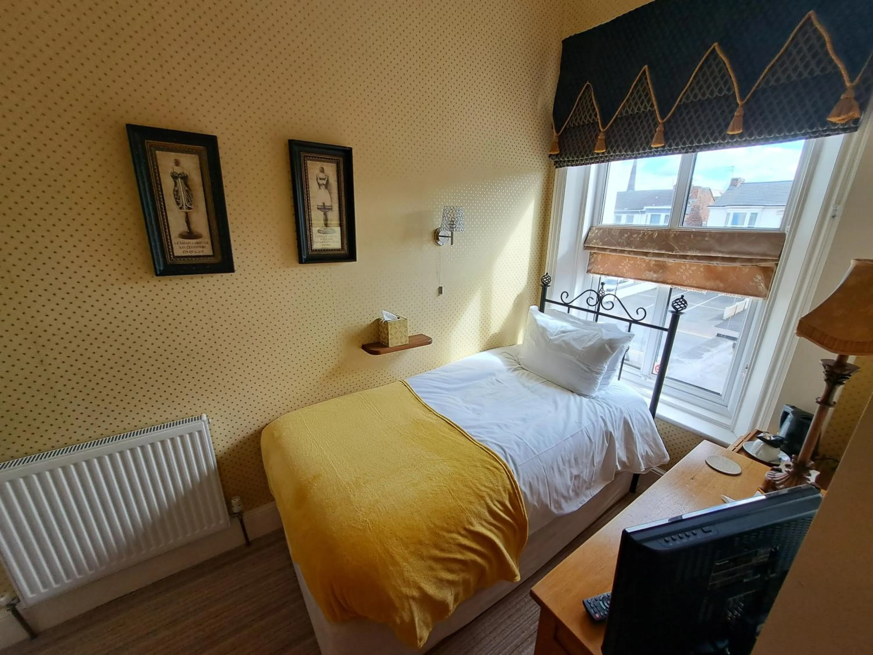 Bed in The Ambassador Townhouse