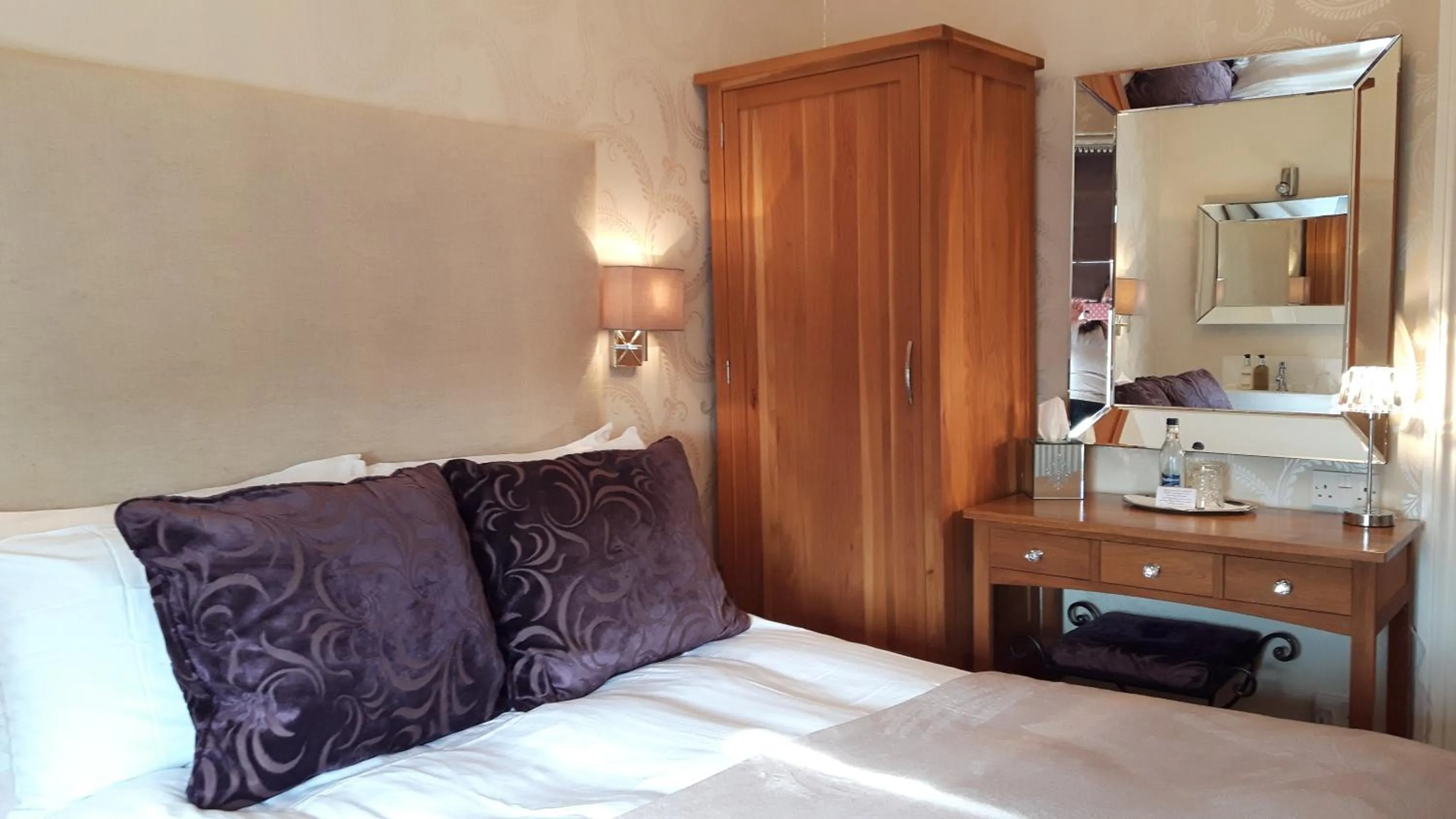 Bed in The Ambassador Townhouse