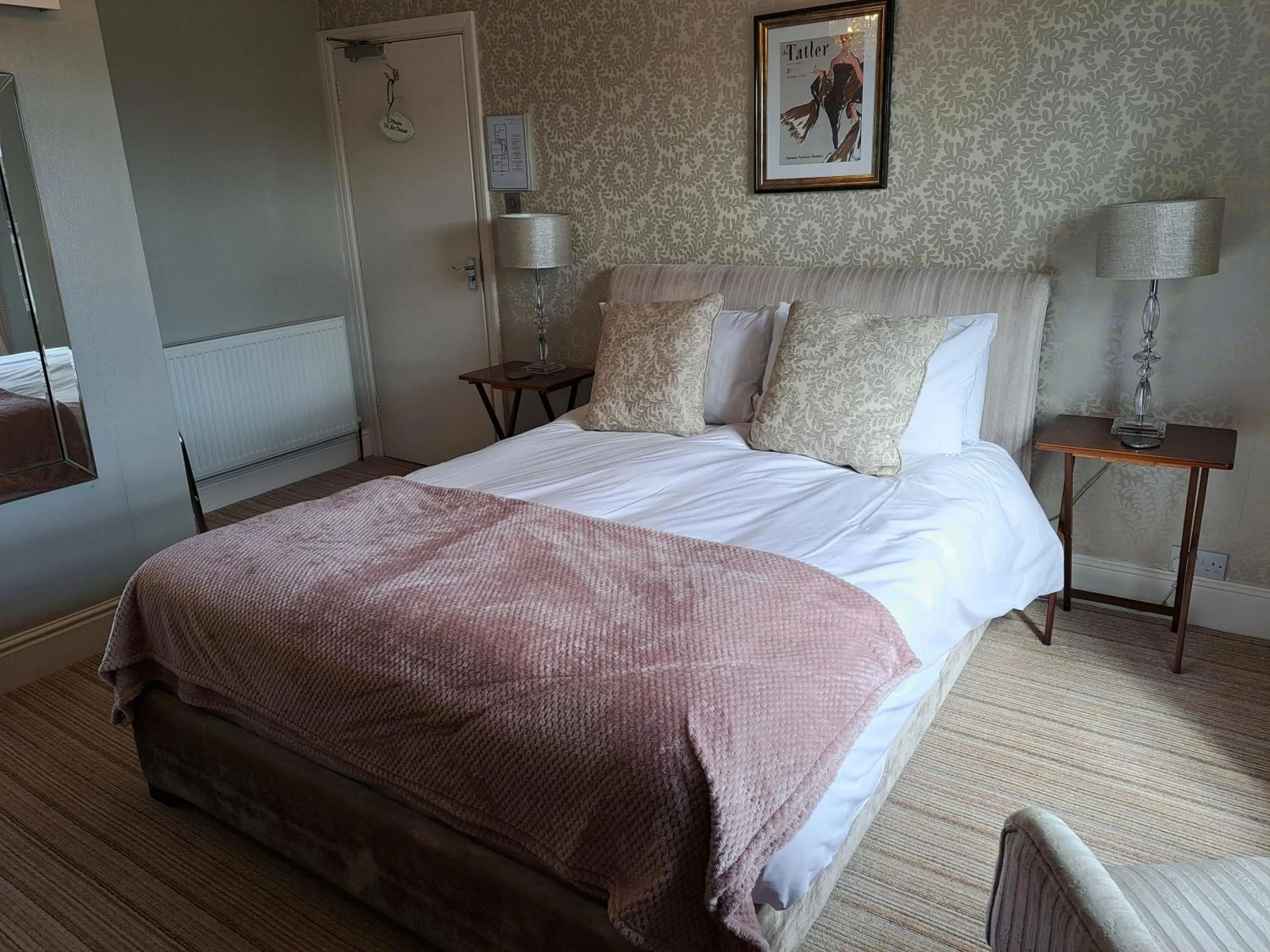 Bed in The Ambassador Townhouse