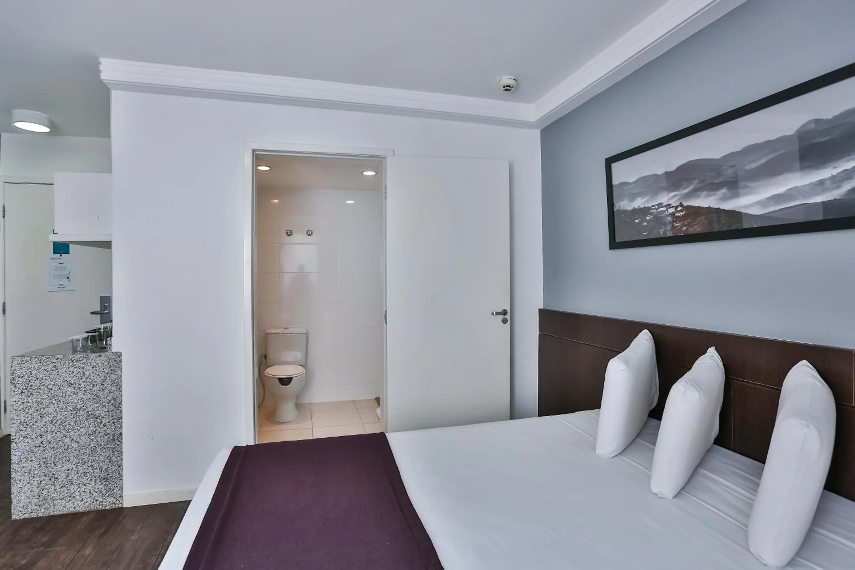 Bed in San Diego Suites Pampulha Hotel - Oficial