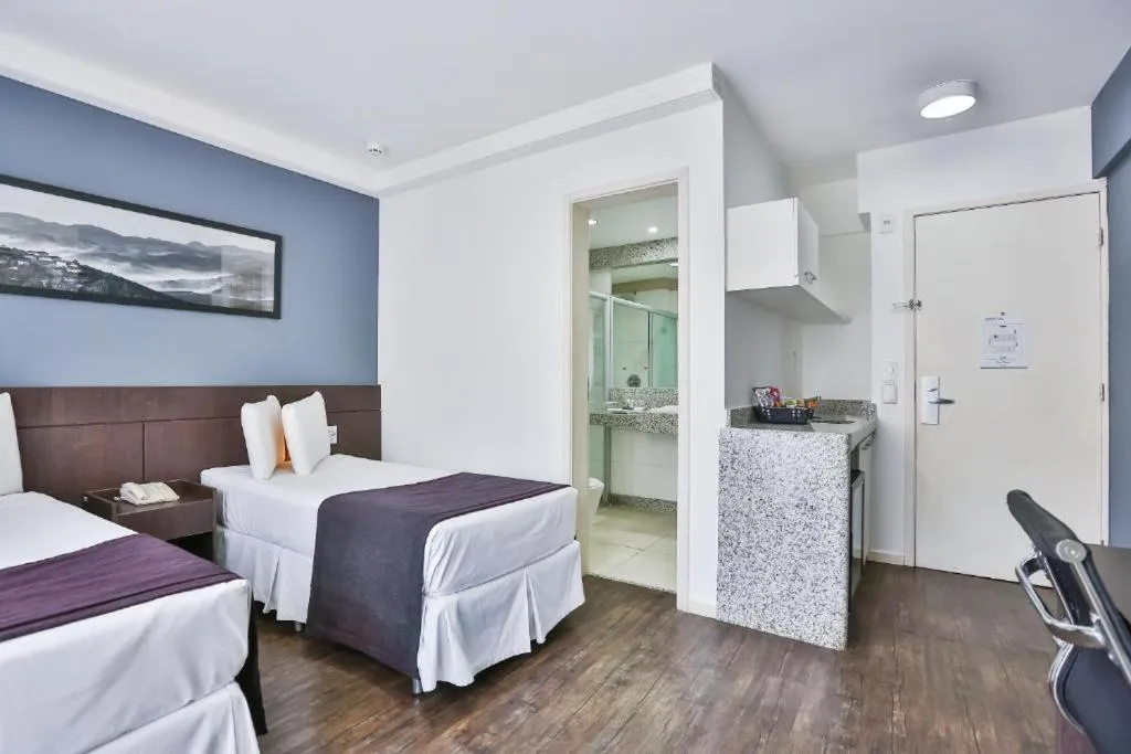 Bed in San Diego Suites Pampulha Hotel - Oficial