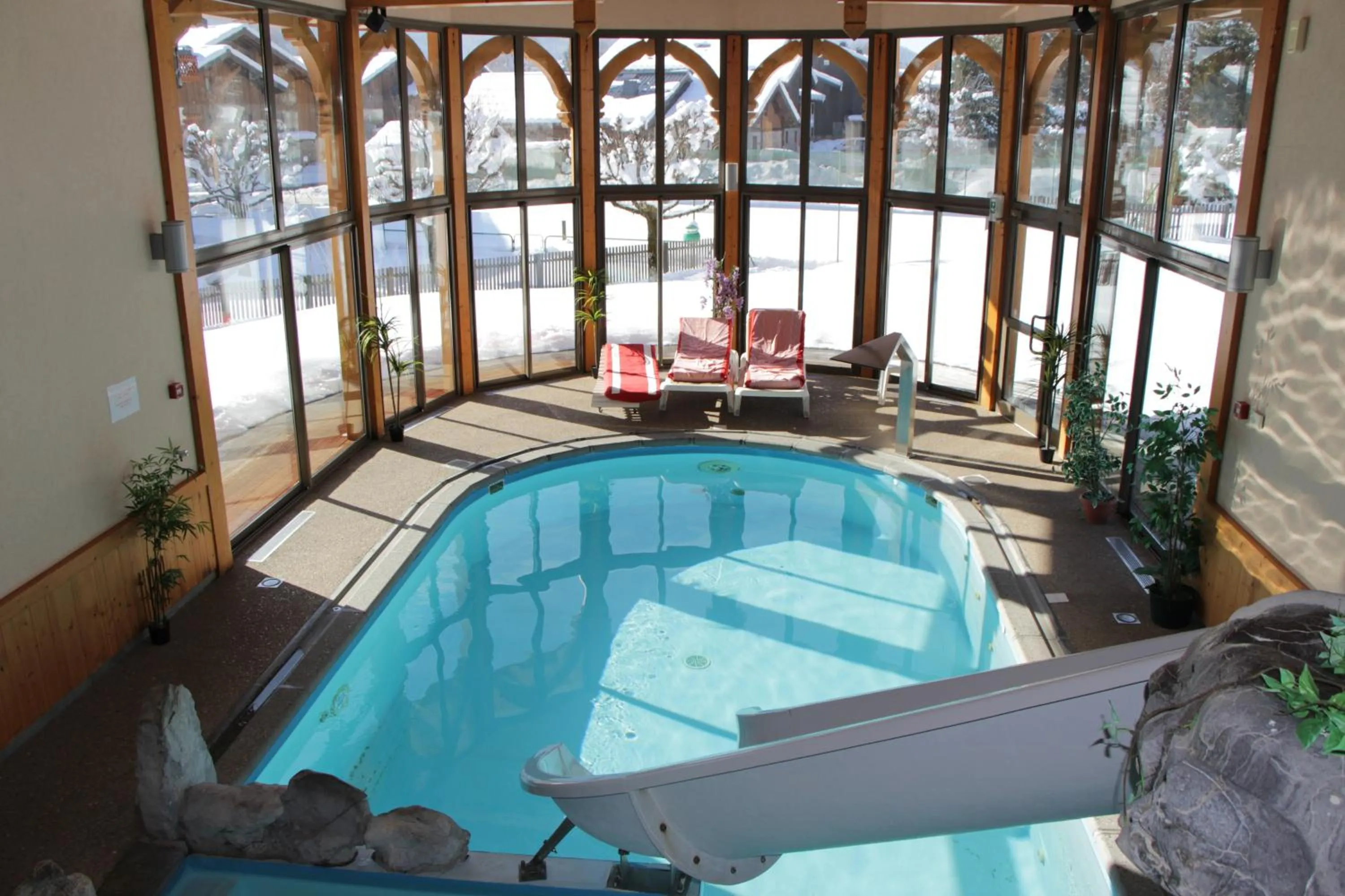 Swimming pool in Chalet-Hôtel Neige et Roc, The Originals Relais