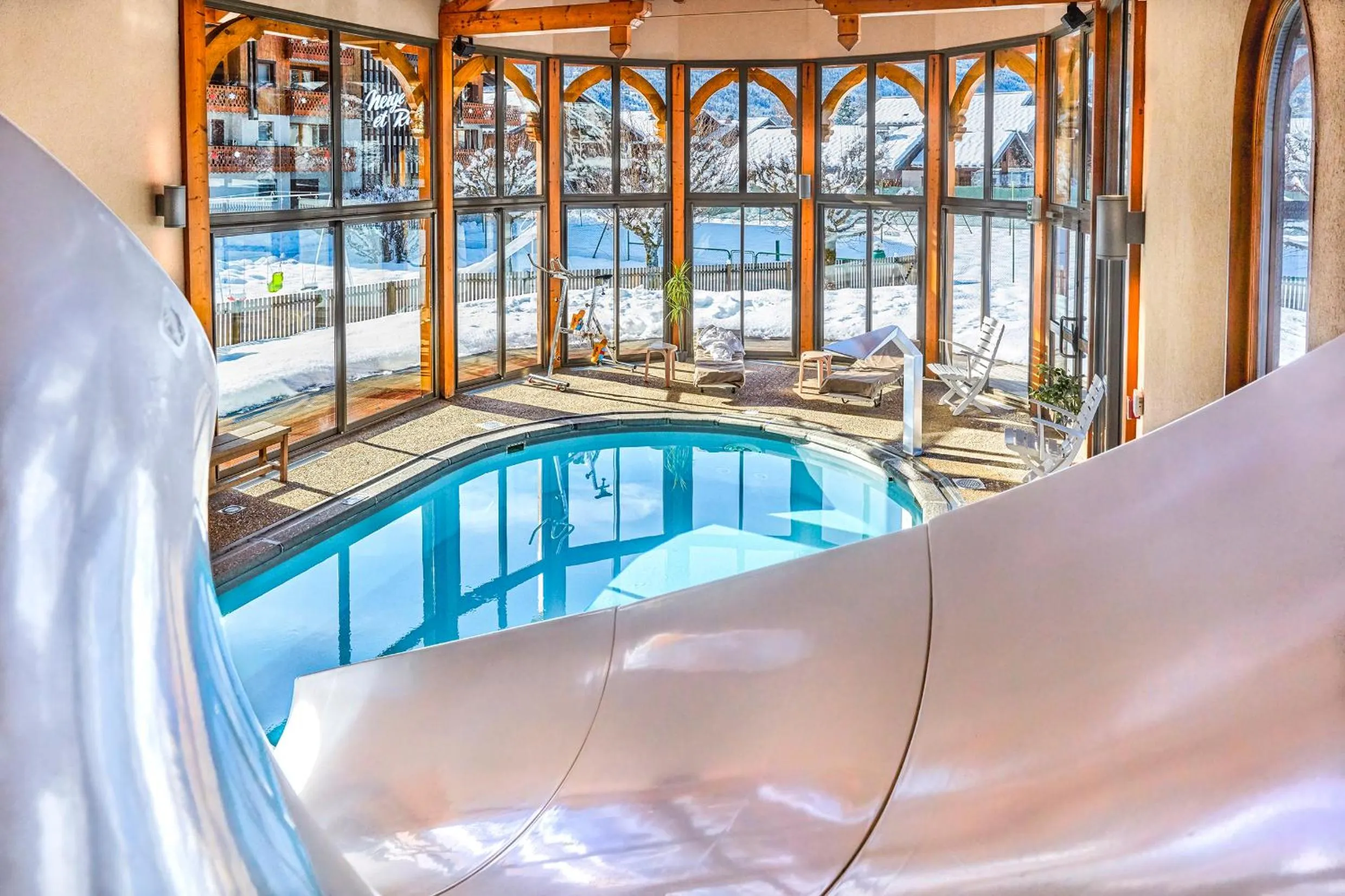 Swimming pool in Chalet-Hôtel Neige et Roc, The Originals Relais