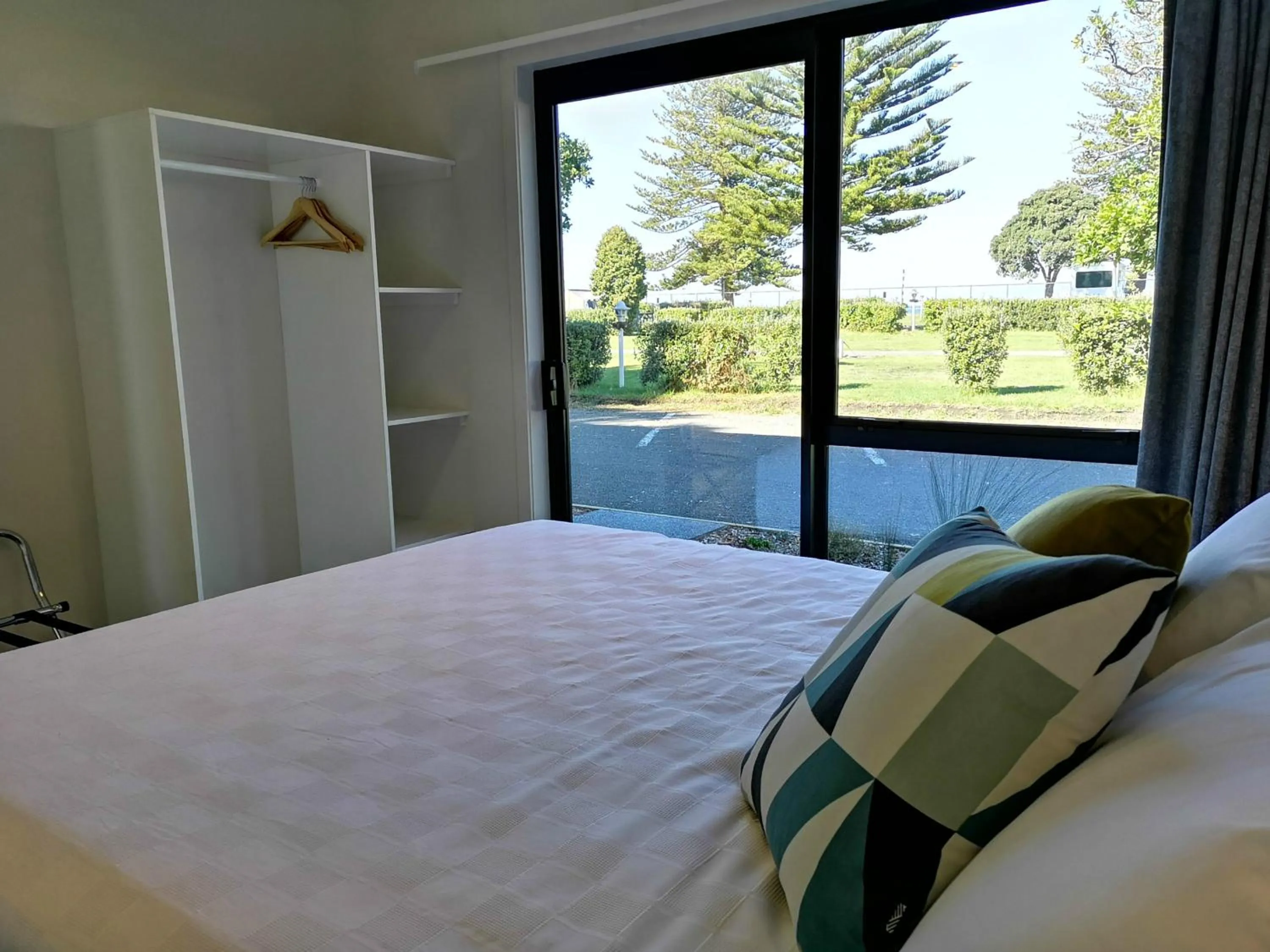 Bed in Waikanae Beach Ocean View Apartments