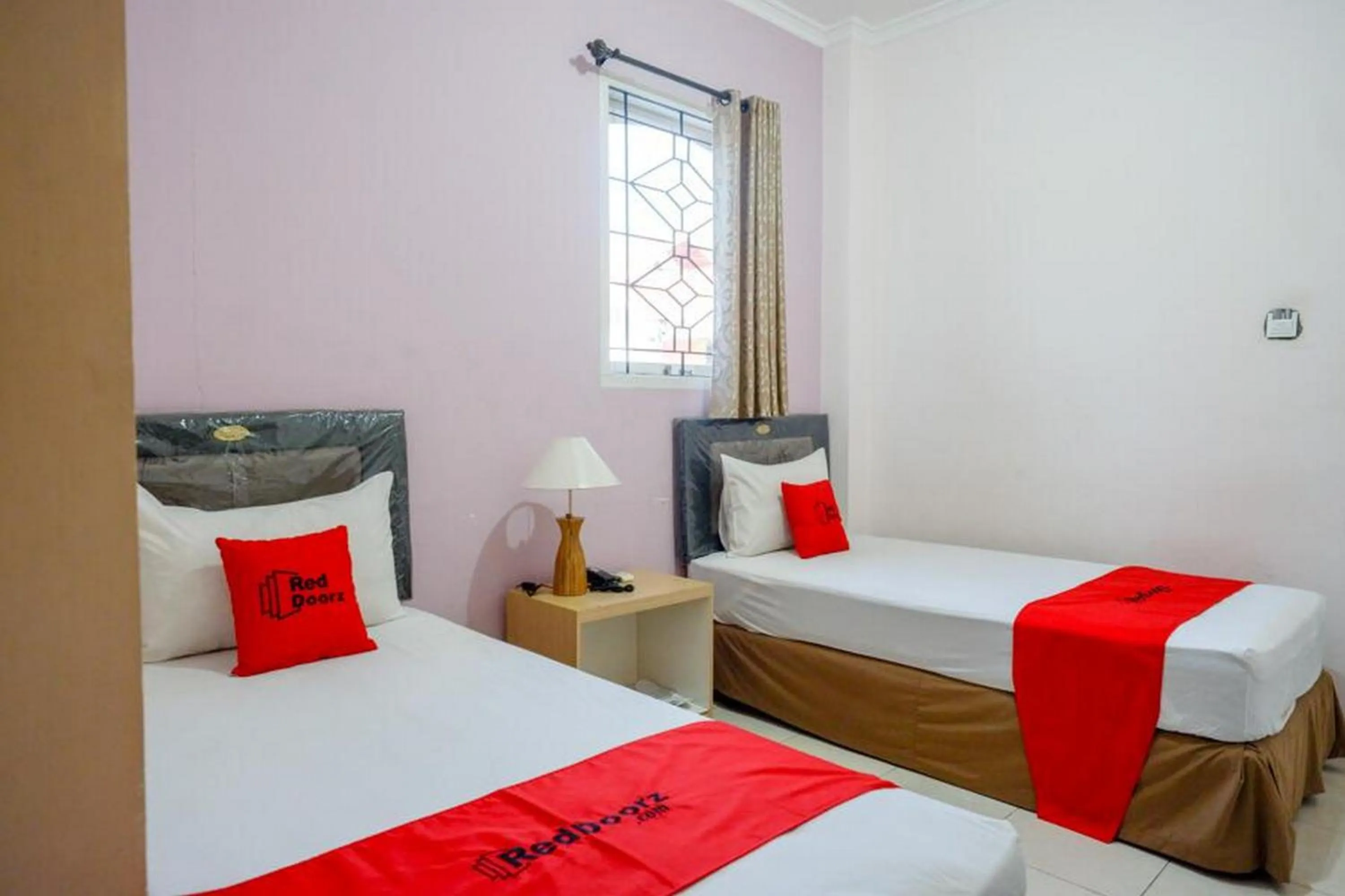 Bedroom in RedDoorz Plus Syariah @ Hotel Boulevard Luwuk