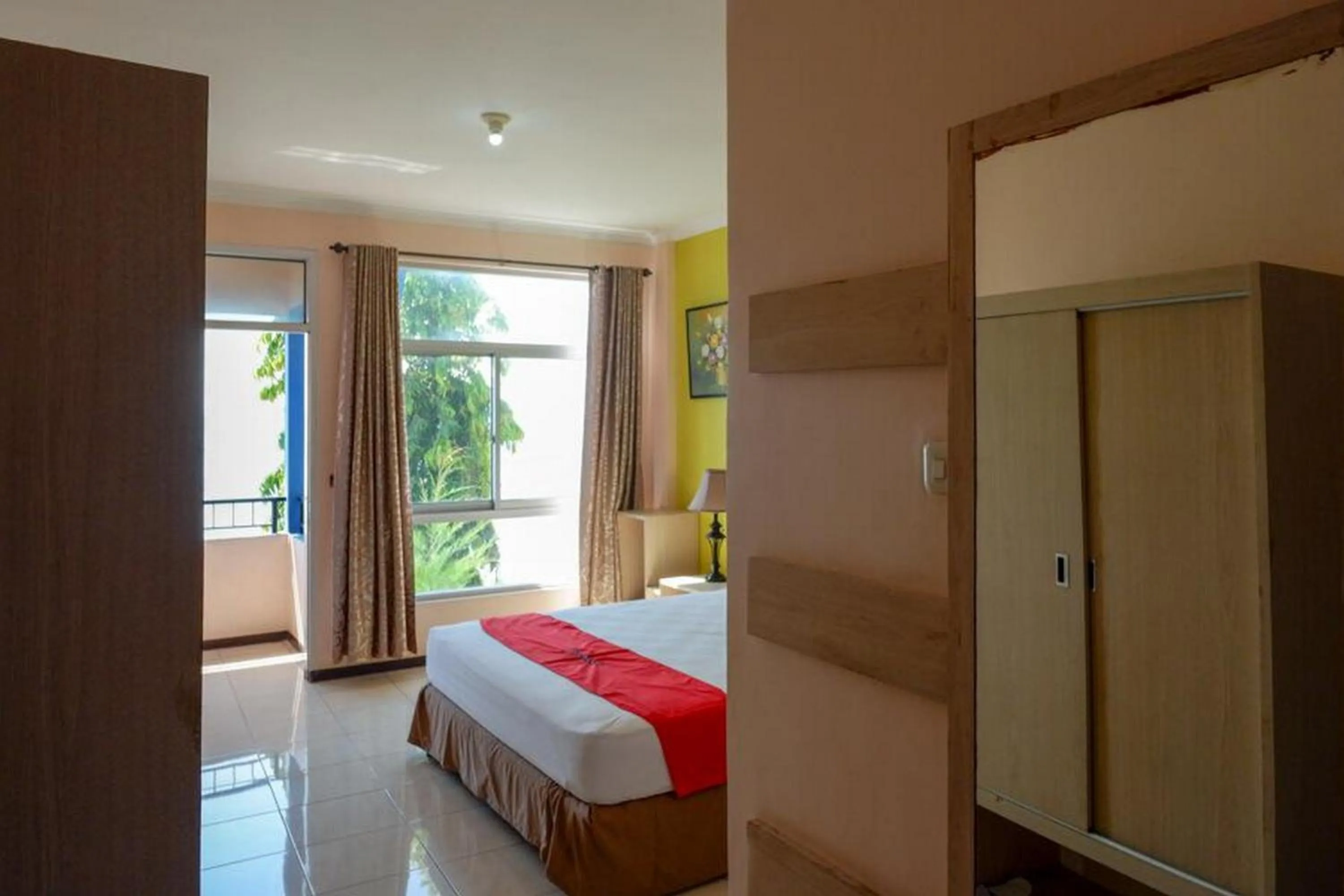 Bedroom in RedDoorz Plus Syariah @ Hotel Boulevard Luwuk