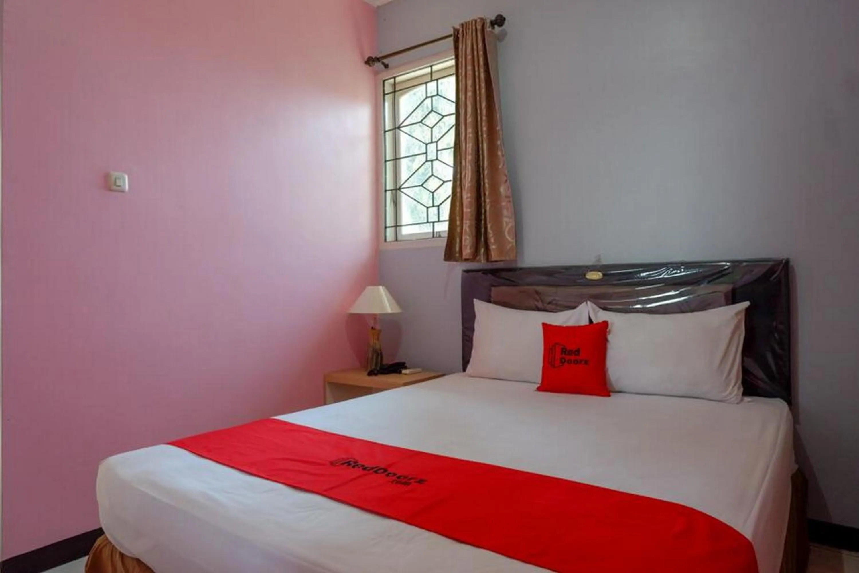 Bedroom in RedDoorz Plus Syariah @ Hotel Boulevard Luwuk