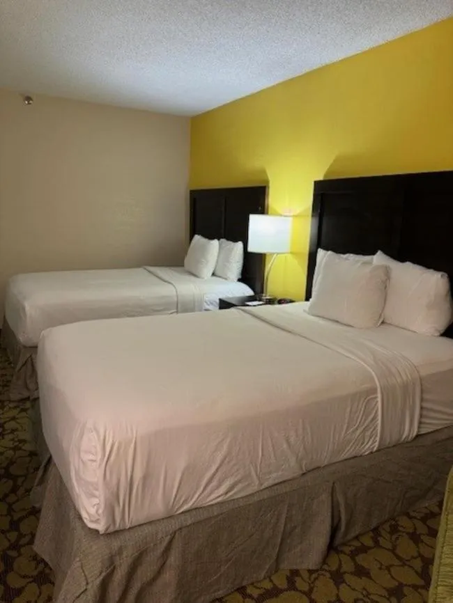 Photo of the whole room in Ramada Plaza by Wyndham Charlotte South End Airport