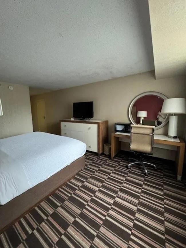 Photo of the whole room in Ramada Plaza by Wyndham Charlotte South End Airport
