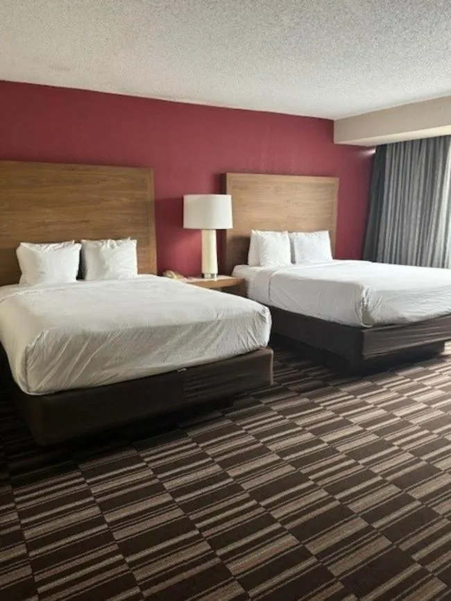 Photo of the whole room in Ramada Plaza by Wyndham Charlotte South End Airport