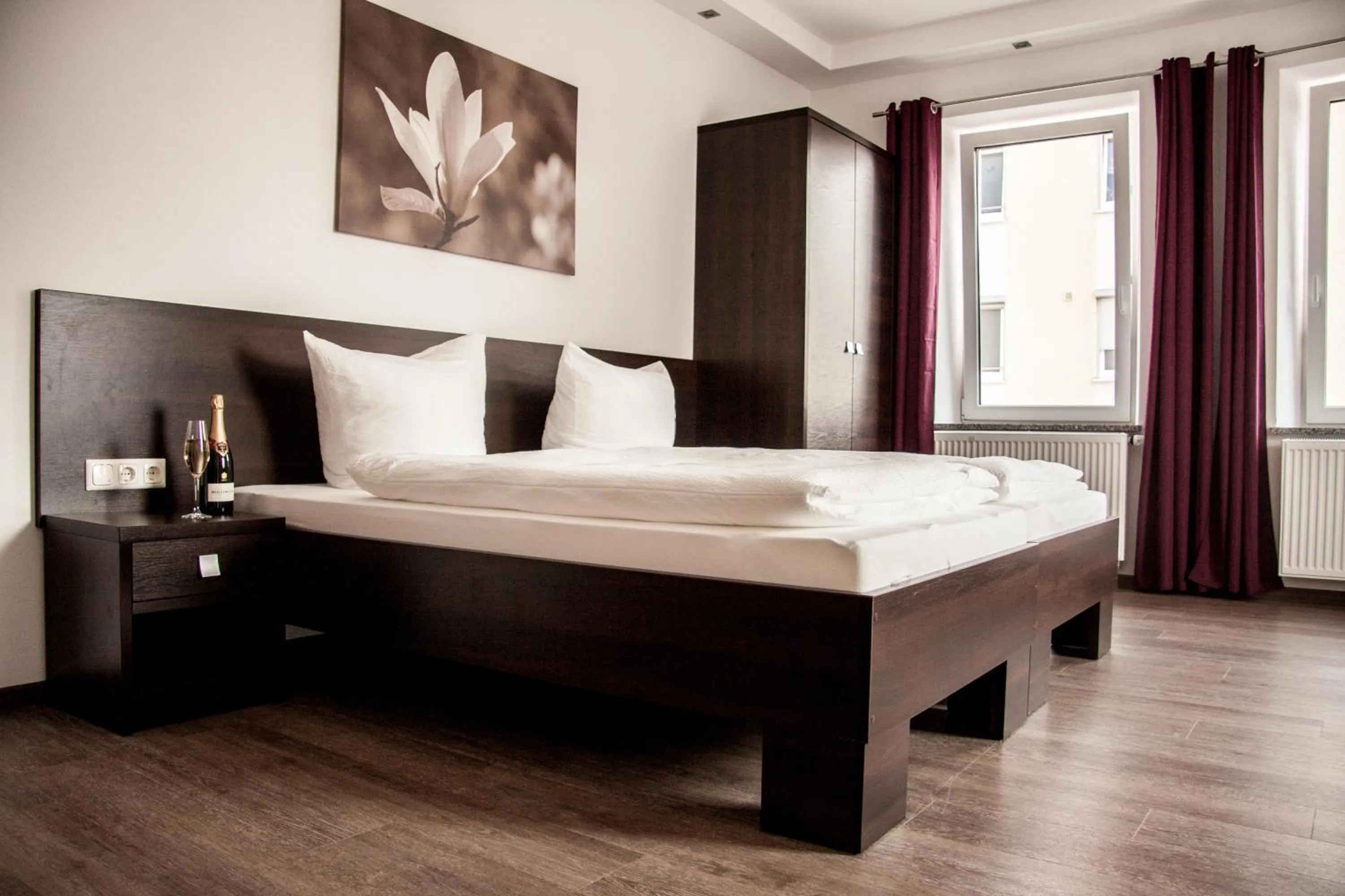 Bedroom, Bed in Aparthotel - Stadtvilla Premium