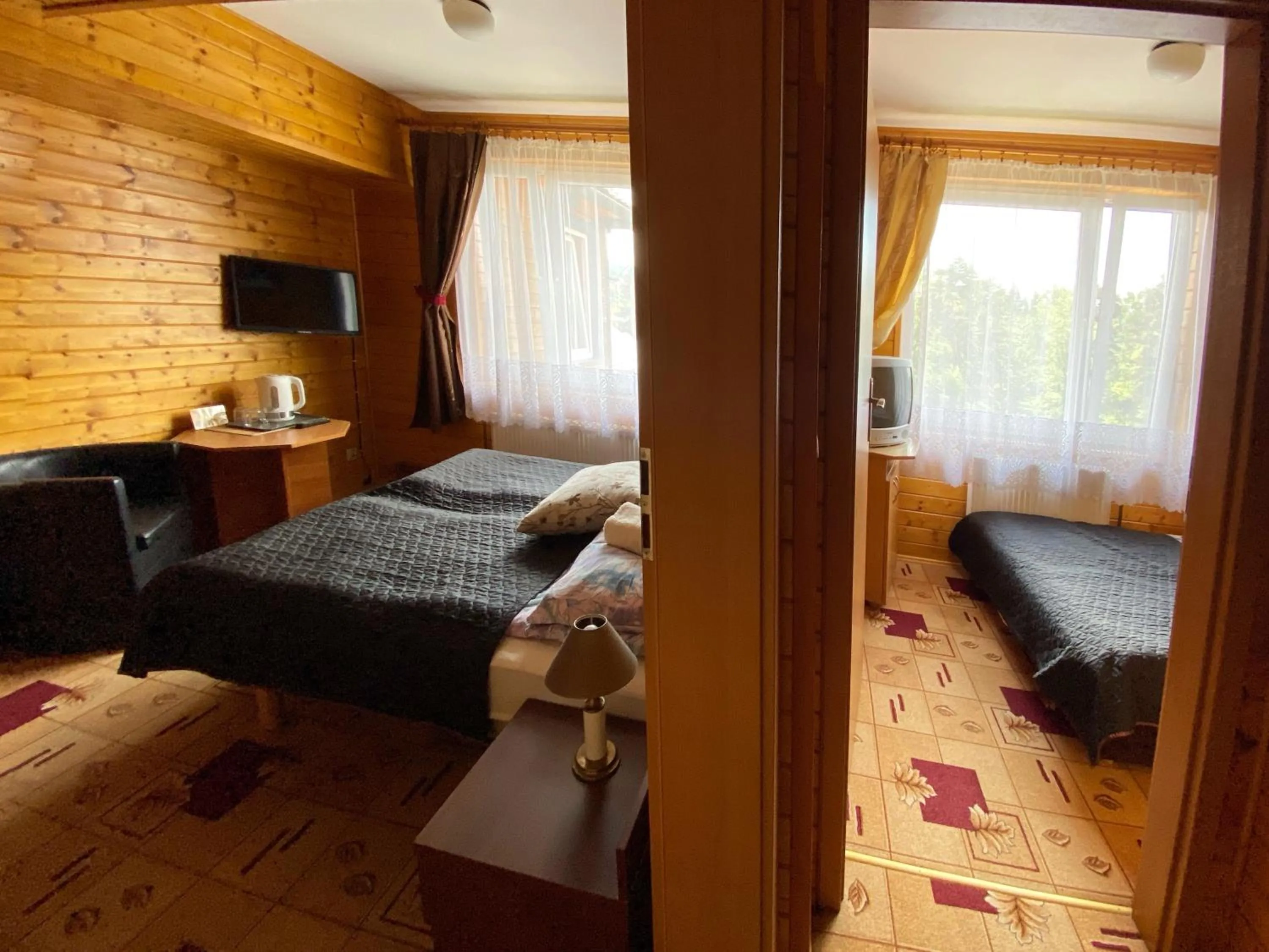 Communal lounge/ TV room, Bed in Willa Światowid