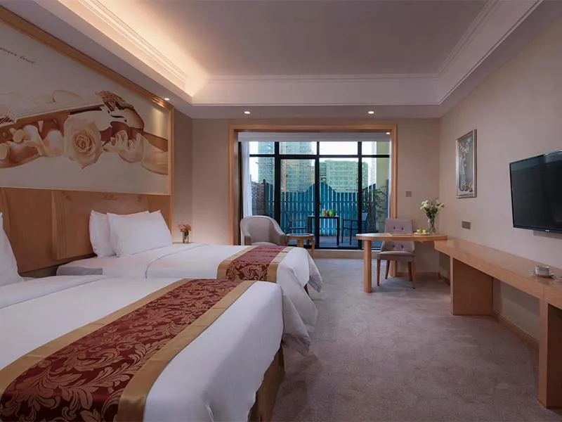 Bed in Vienna Hotel (Qionghai Yinhai Road)