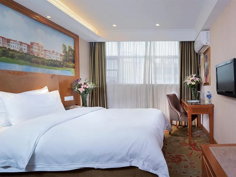 Bed in Vienna Classic Hotel (Anlu Hengkun)