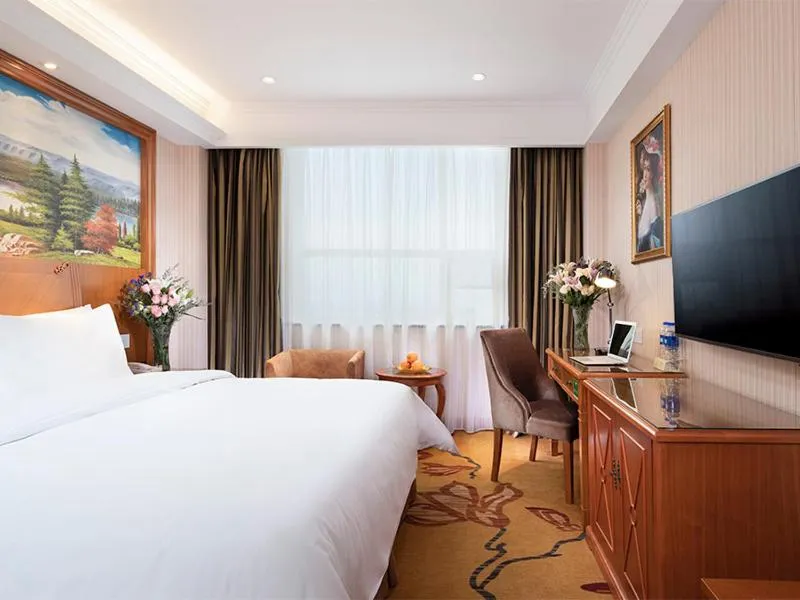 Bed in Vienna Classic Hotel (Anlu Hengkun)