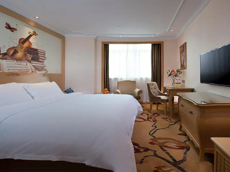 Bed in Vienna International Hotel (Fangchenggang Administration Center High-speed Railway Station branch)