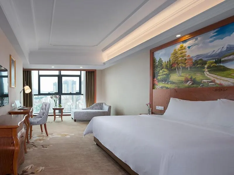 Bed in Vienna International Hotel(Jinjiang Jordan Center)