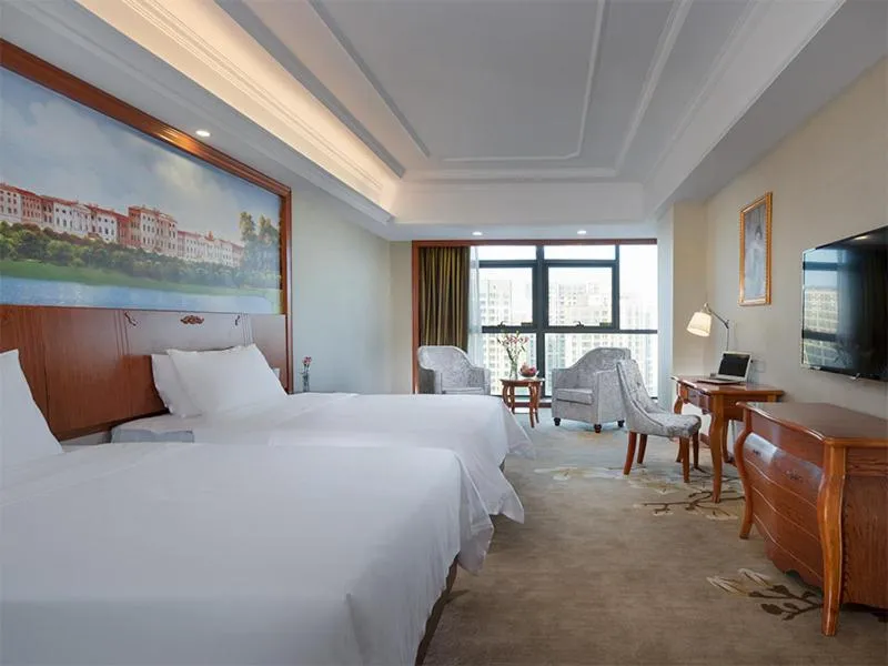 Bed in Vienna International Hotel(Jinjiang Jordan Center)