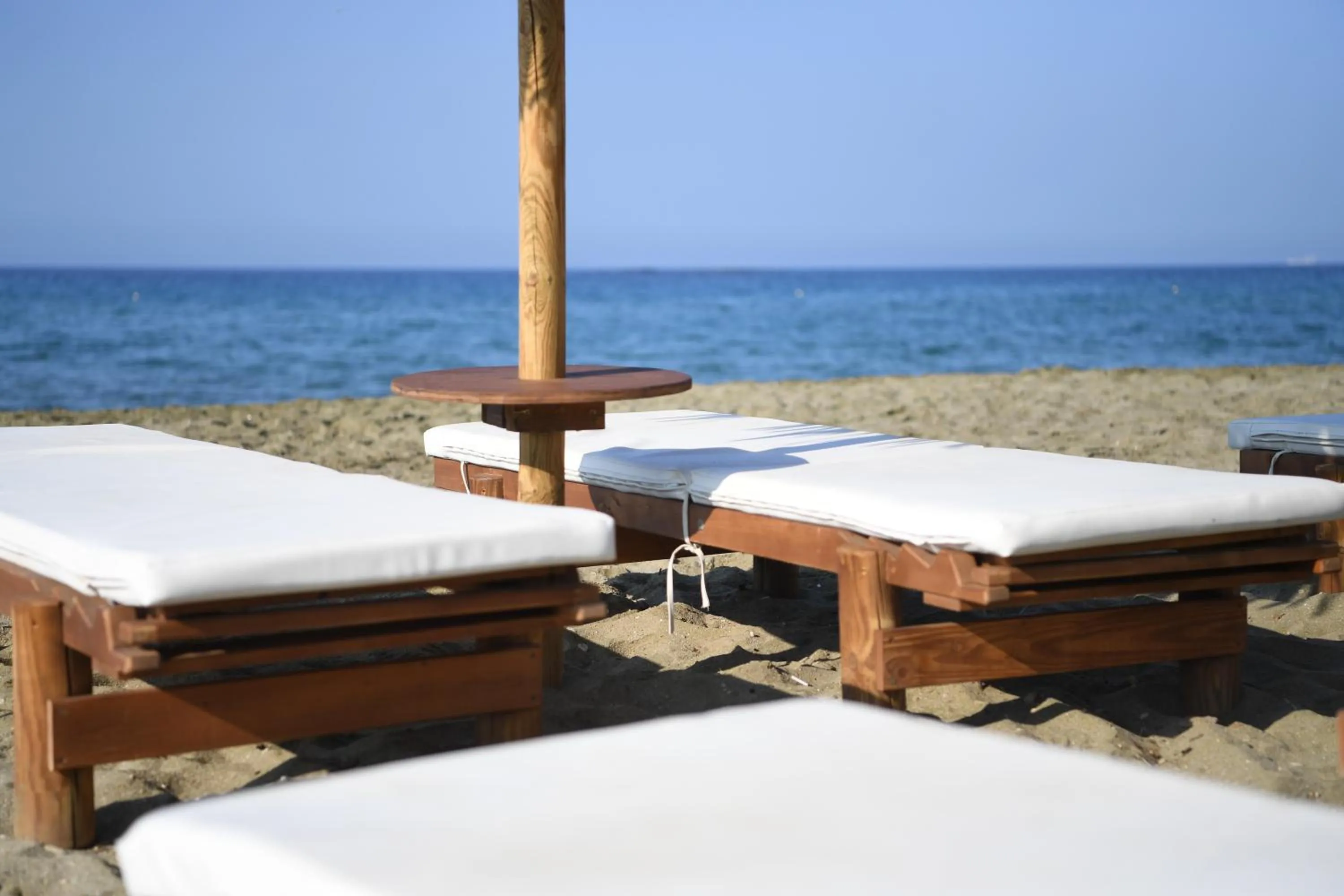 Beach in Nostos Beachfront Apartments & Studios
