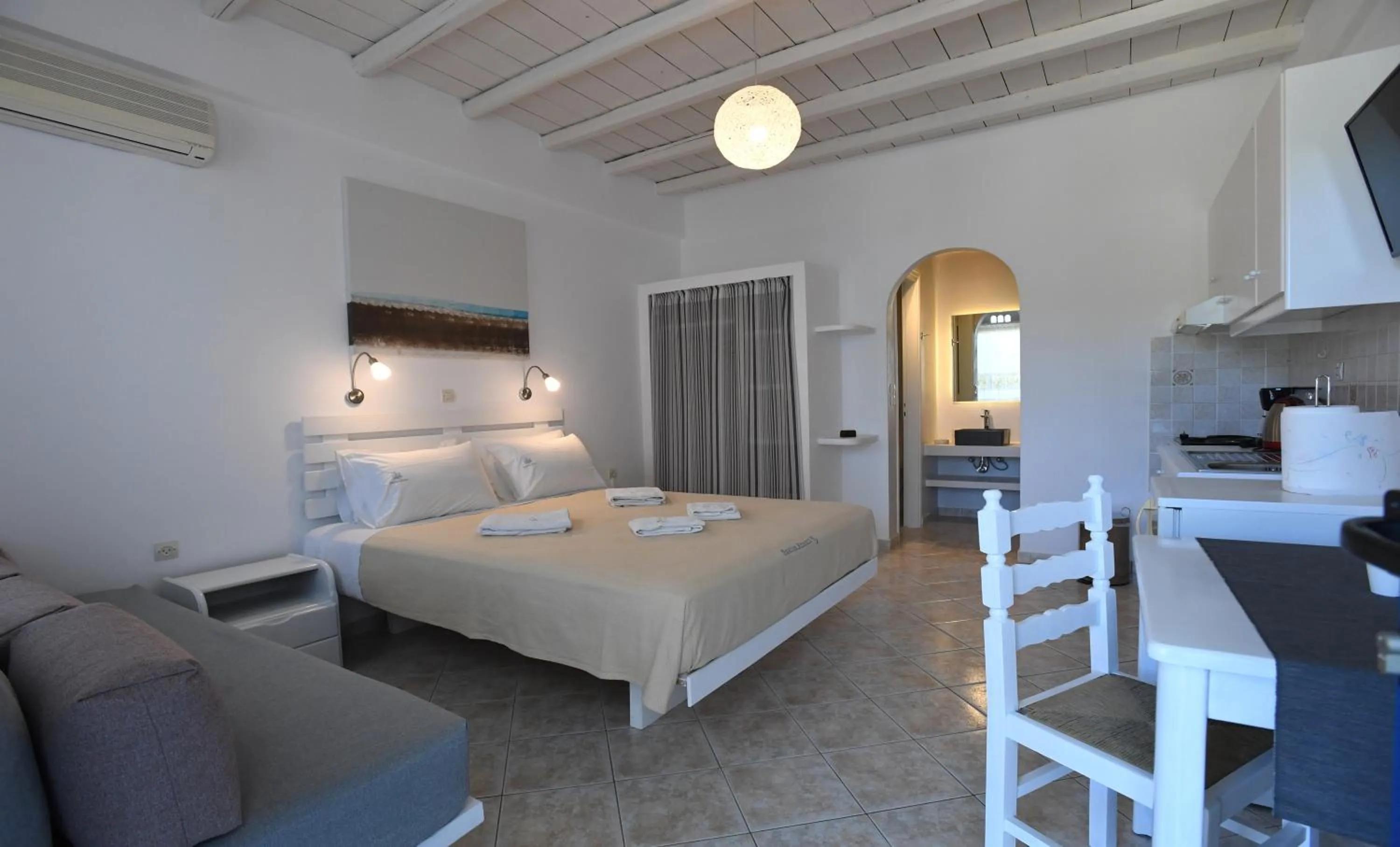 Bed in Nostos Beachfront Apartments & Studios