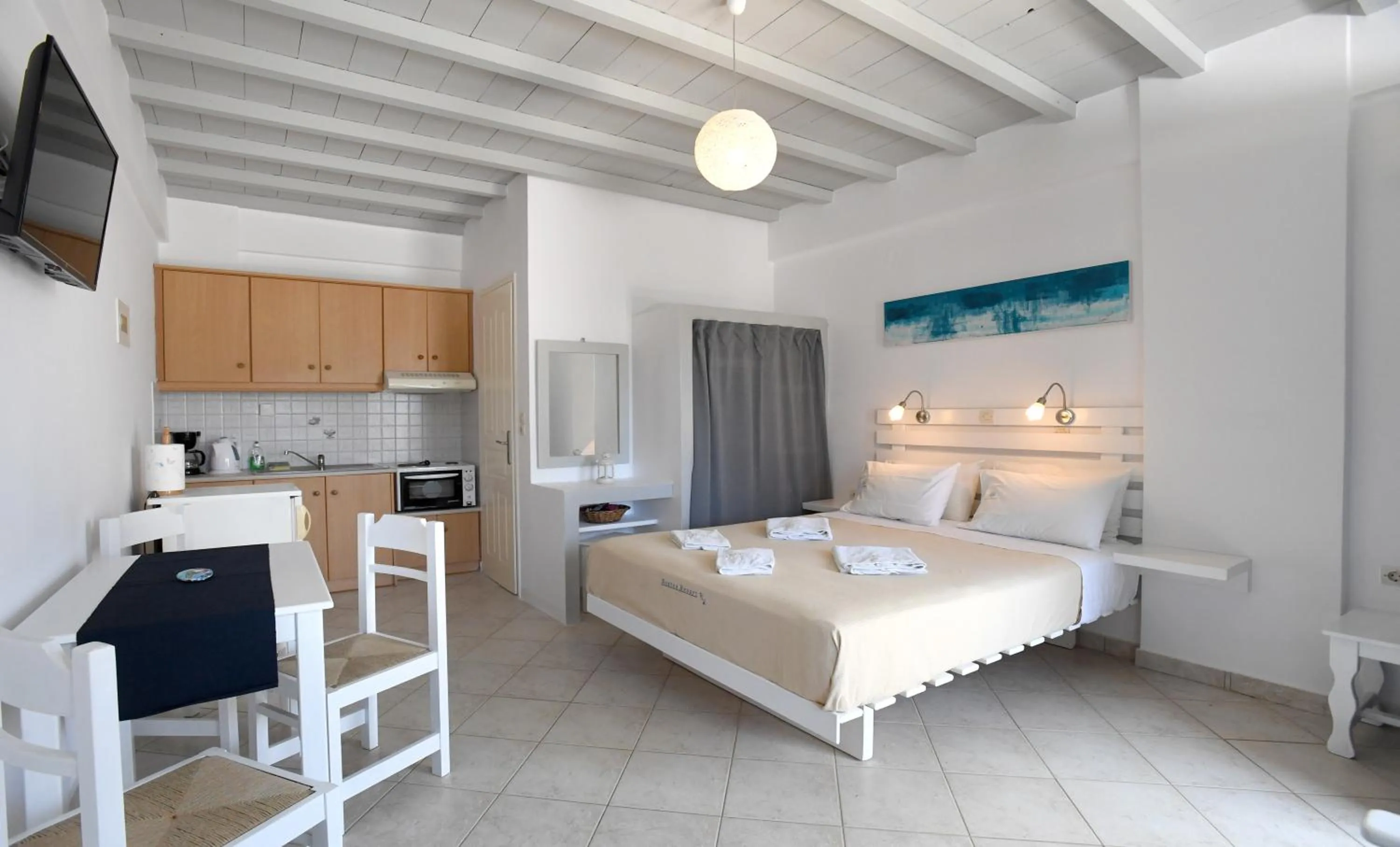 Bed in Nostos Beachfront Apartments & Studios
