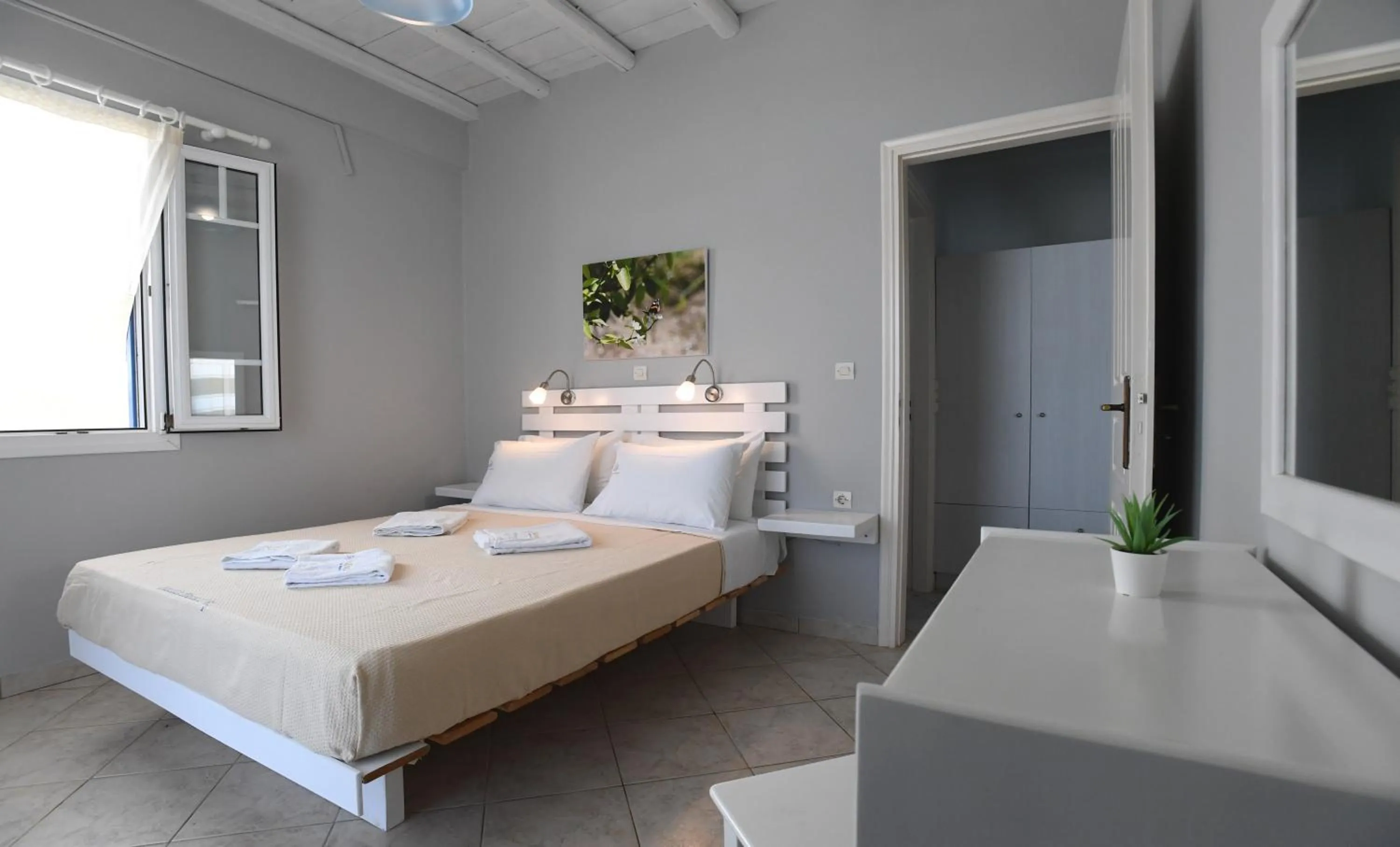 Bed in Nostos Beachfront Apartments & Studios