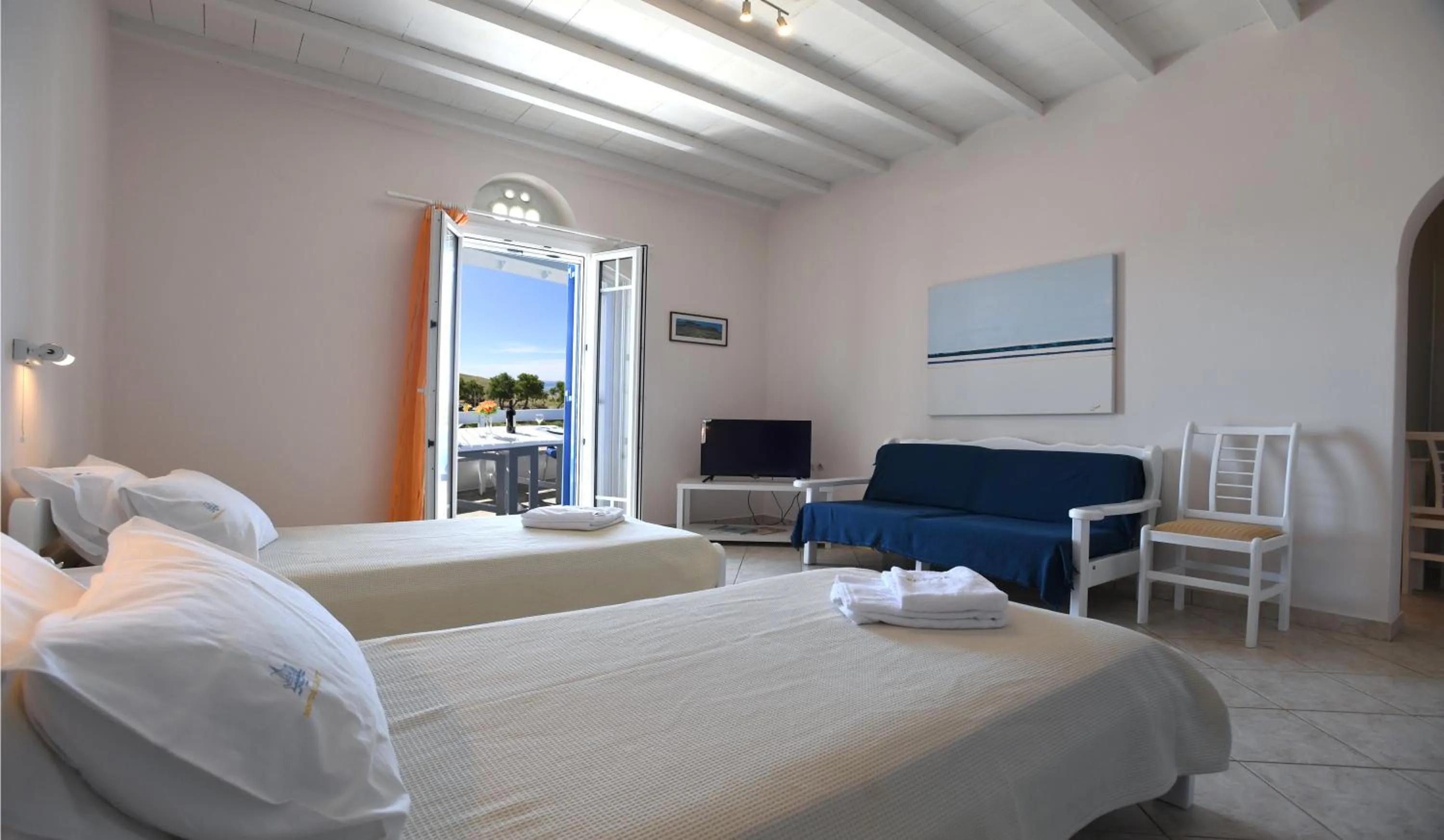 Bed in Nostos Beachfront Apartments & Studios