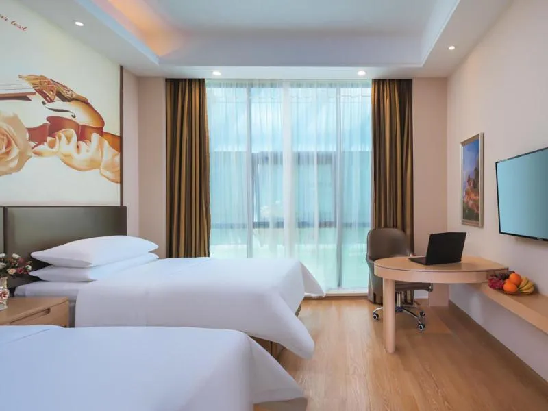 Bed in Vienna Hotel (Shanghai jinshanwei Railway Station City Beach Shop)