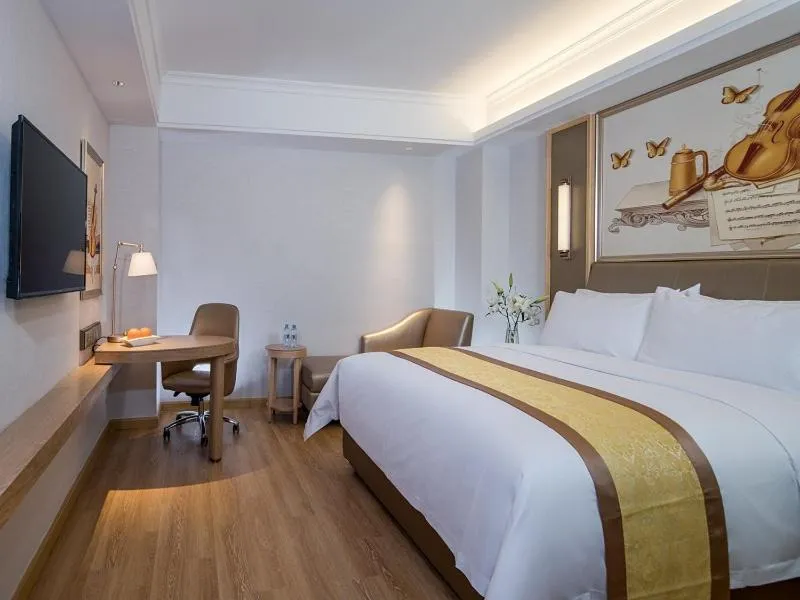 Bed in Vienna Hotel (Shanghai jinshanwei Railway Station City Beach Shop)