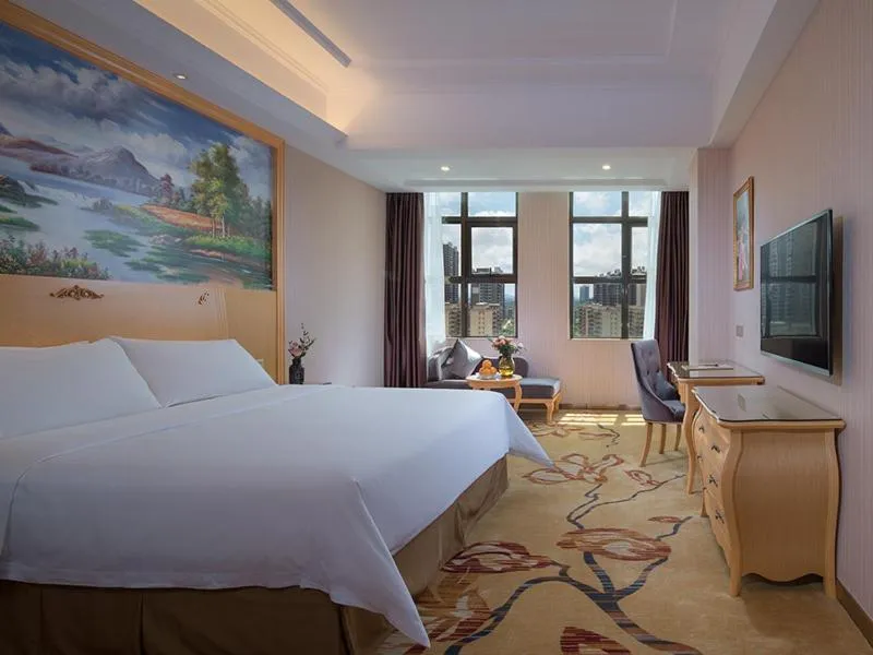 Bed in Vienna International Hotel Maoming Dianbai Wanda Plaza