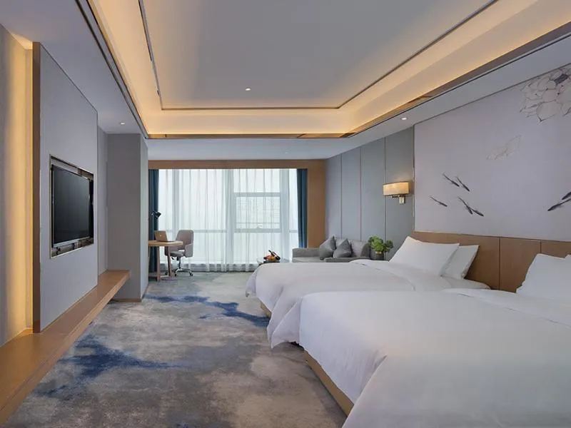 Bed in Venus Royal Hotel(Foshan Kuiqi Road Metro Station)