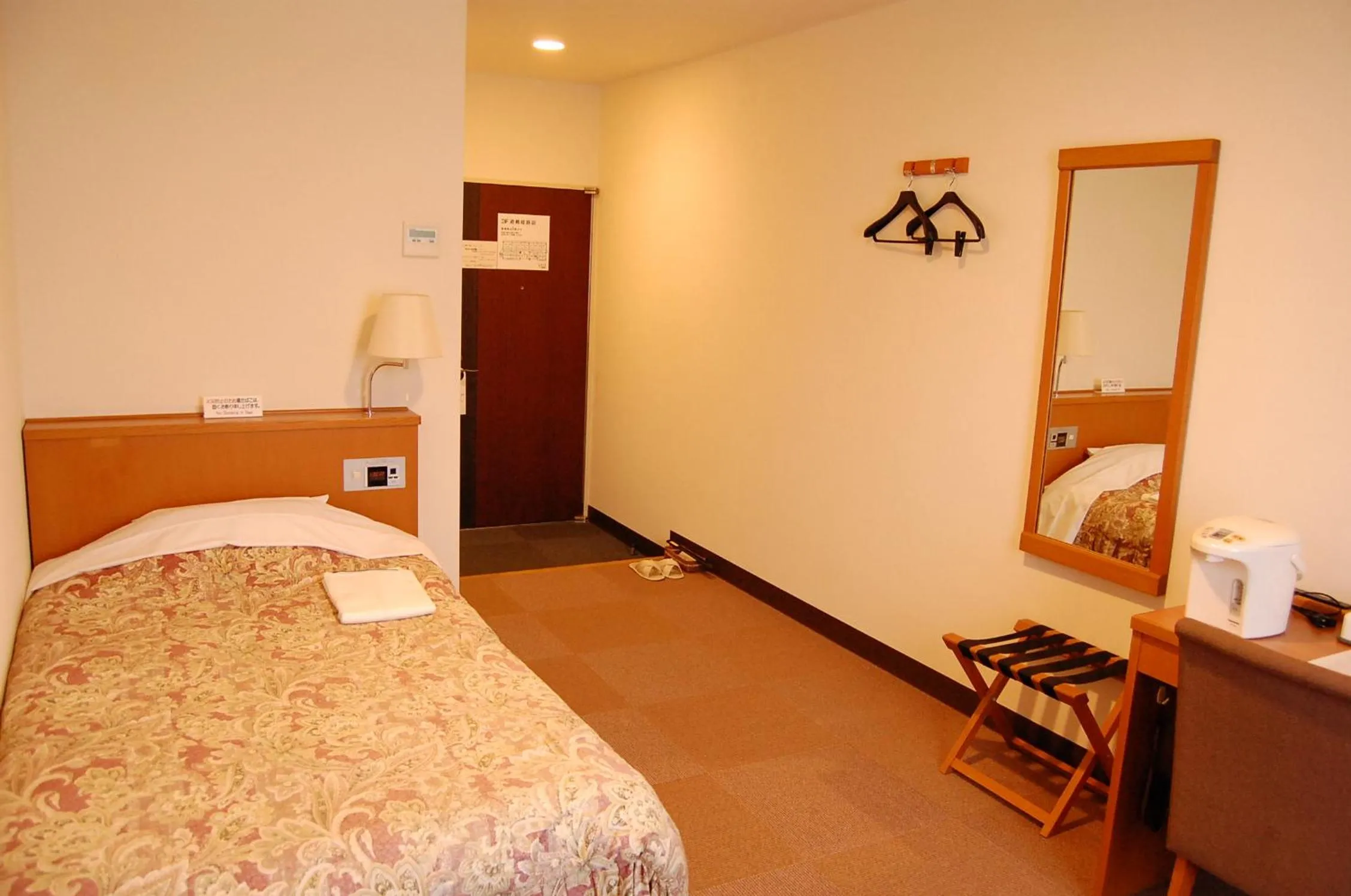Bed in Daini Prince Hotel Muroran View