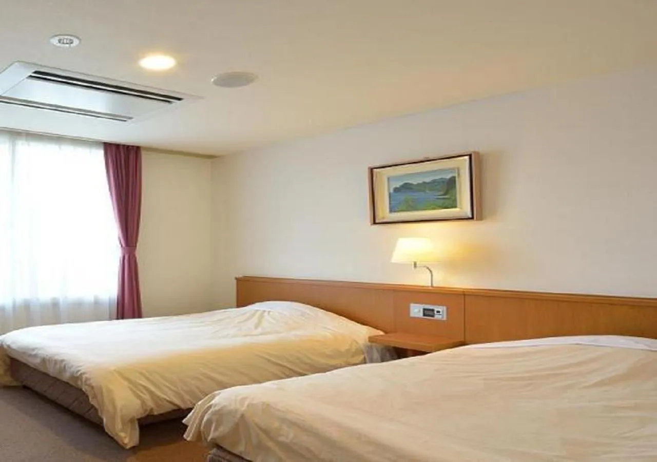Photo of the whole room, Bed in Daini Prince Hotel Muroran View