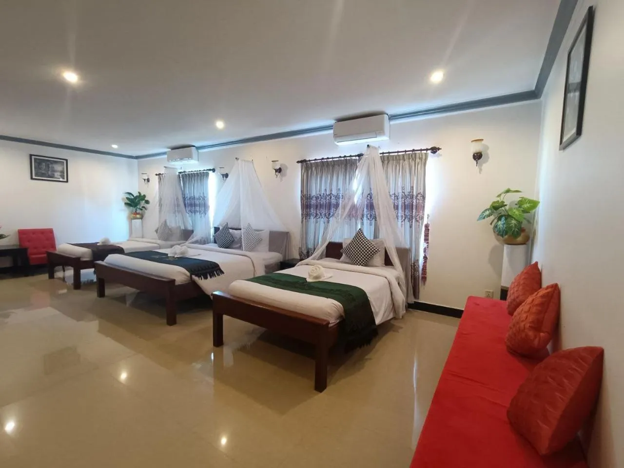 Bed in Parent Heritage Angkor Villa