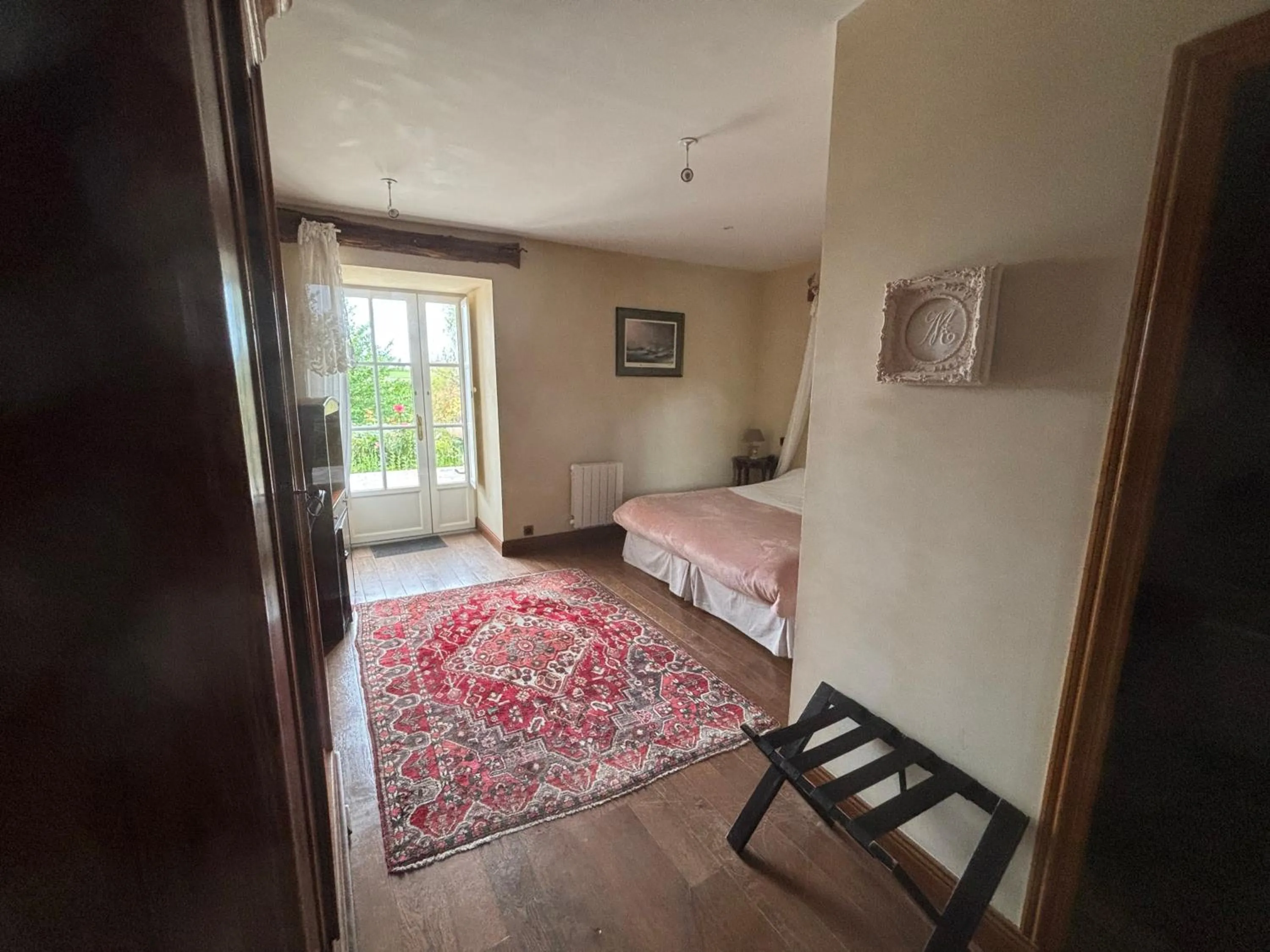 Photo of the whole room, Bed in Manoir Des Douets Fleuris